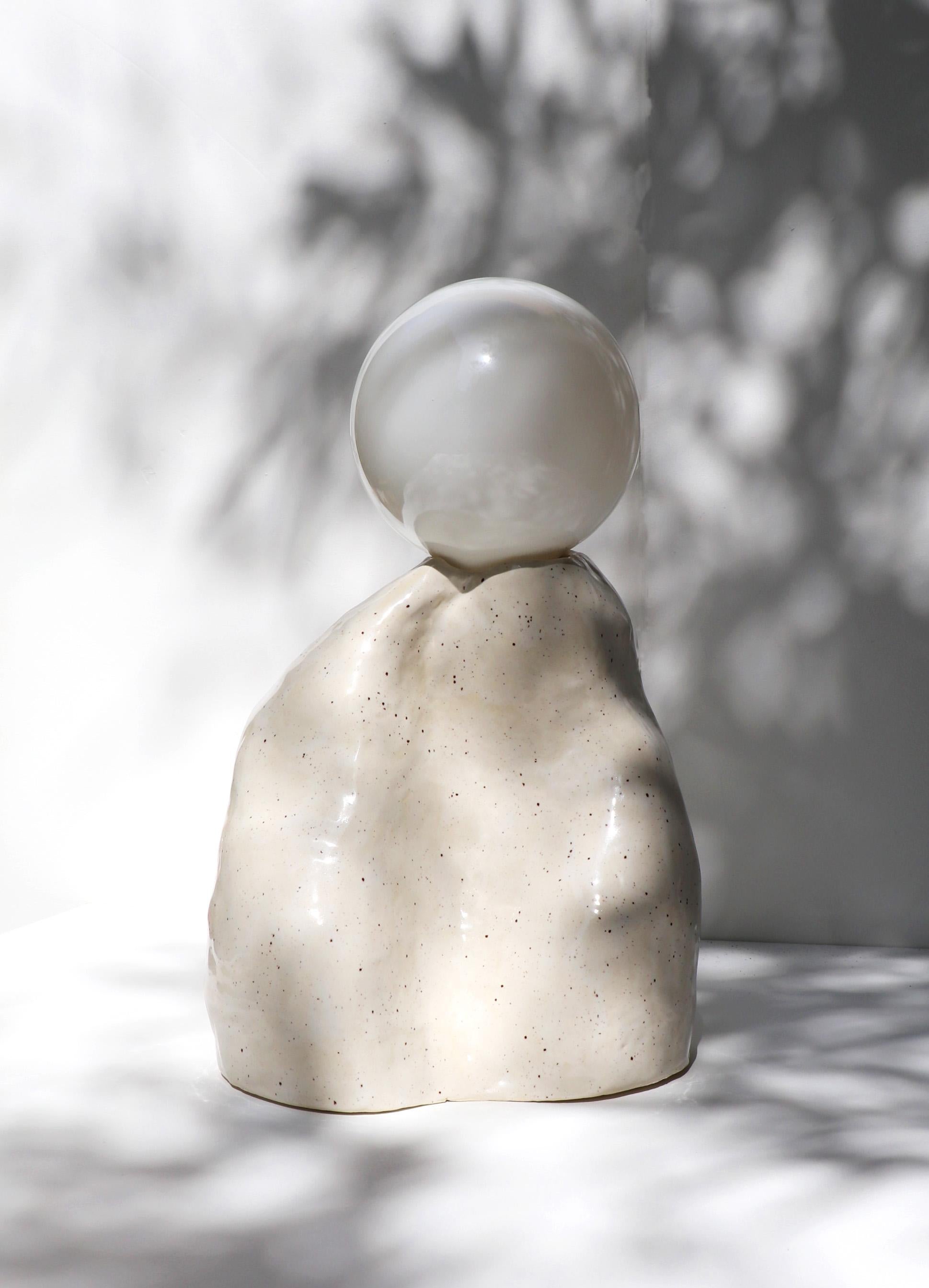 Gloria Lamp by Alice Lahana Studio
Dimensions: W 20 x D 13.5 x H 35 cm
Materials: Stoneware.

The Gloria lamp is handcrafted in the studio workshops. With its organic and abstract shape, the Gloria lamp oscillates between object and sculpture. It is