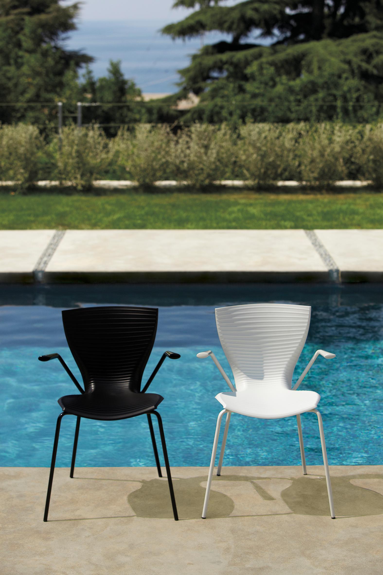 Gloria Meeting Chair by Marc Sadler
Dimensions: D 54 x W 60 x H 80 cm. Seat Height: 48 cm.
Materials: Polypropylene and steel chassis.
Weight: 6 kg.

Available in two different color options: white or black. This product is suitable for indoor and
