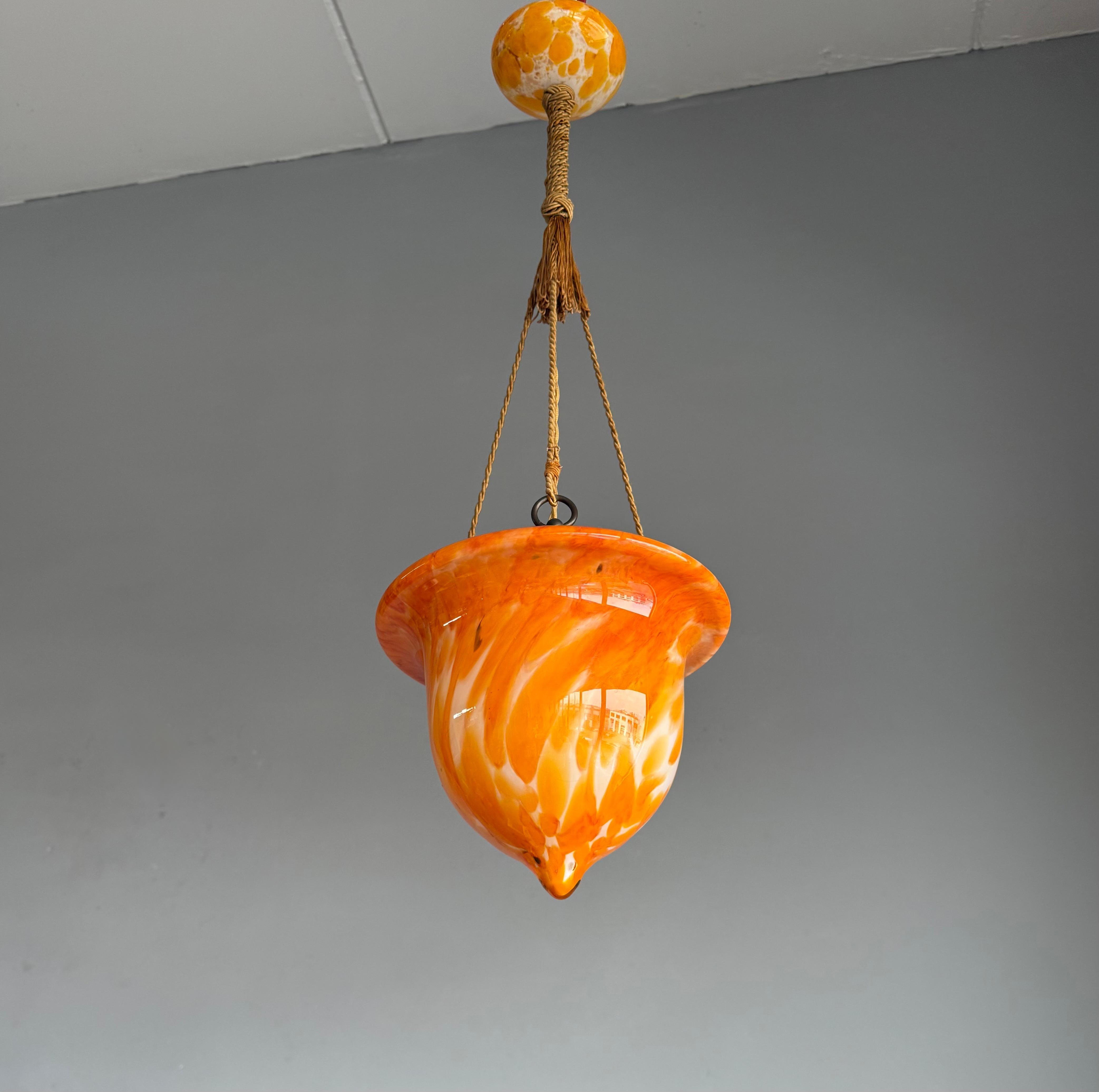 Wonderful design and great looking early 1900 ceiling lamp.

If you are a collector of rare and great looking Arts & Crafts design antiques then this stylish pendant from the 1930s could be perfect for you. This organic-lines design fixture comes