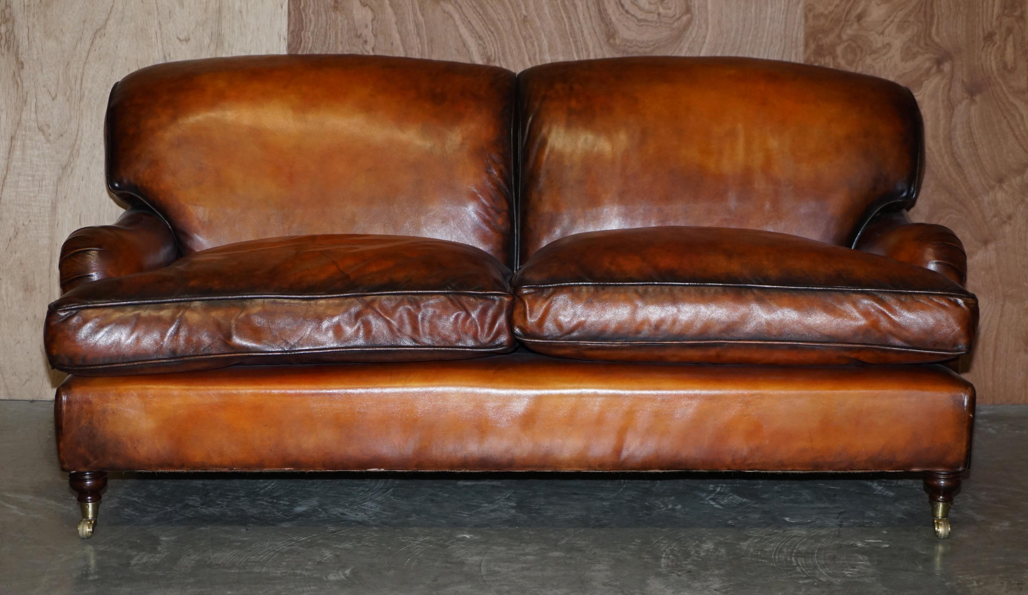 We are delighted to offer for sale this lovely vintage fully restored hand dyed brown leather Howard & Son’s style three seat sofa with overstuffed feather filled cushions

I have a matching three seat sofa which is listed under my other items,