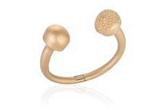 Glory Embossed Cuff Bracelet in 18k Gold by Nada Ghazal Fine Jewelry