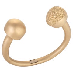 Glory Embossed Cuff Bracelet in 18k Gold by Nada Ghazal Fine Jewelry