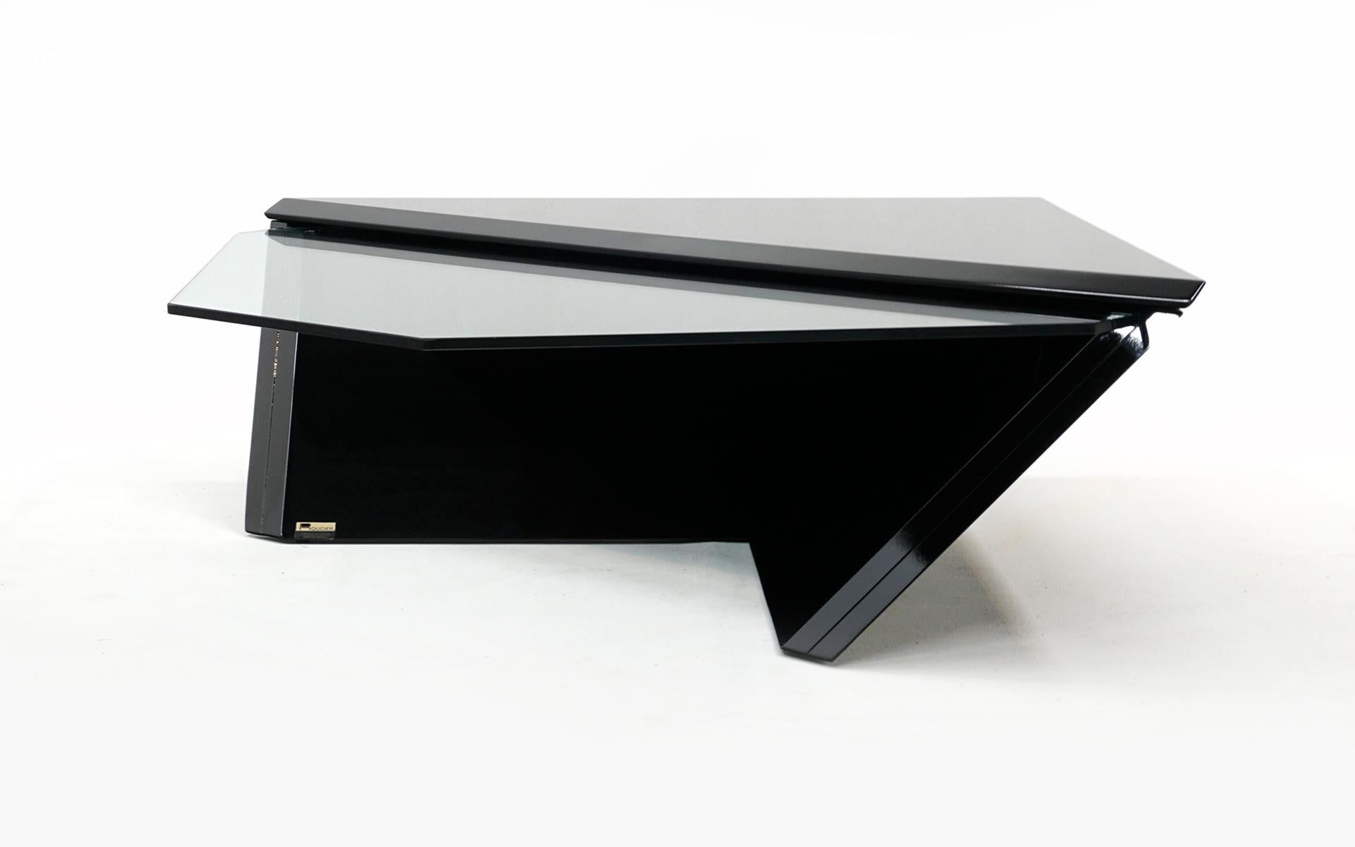 Gloss black and clear glass geometric, diamond shape coffee table designed and made by Rougier, Canada, circa 1970. We have had this piece expertly restored and finished in the original gloss black. It is stunning in person. This unique design