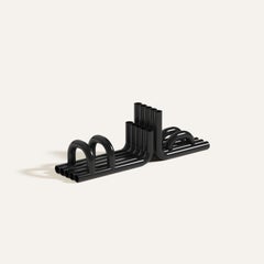 Glossy Black Tube Bookends by Maha Alavi Studio