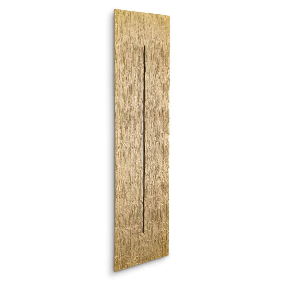 Wanddekoration Glow Brass mit aller Struktur
aus massivem Aluminium in Goldoptik mit Tropfenmuster.