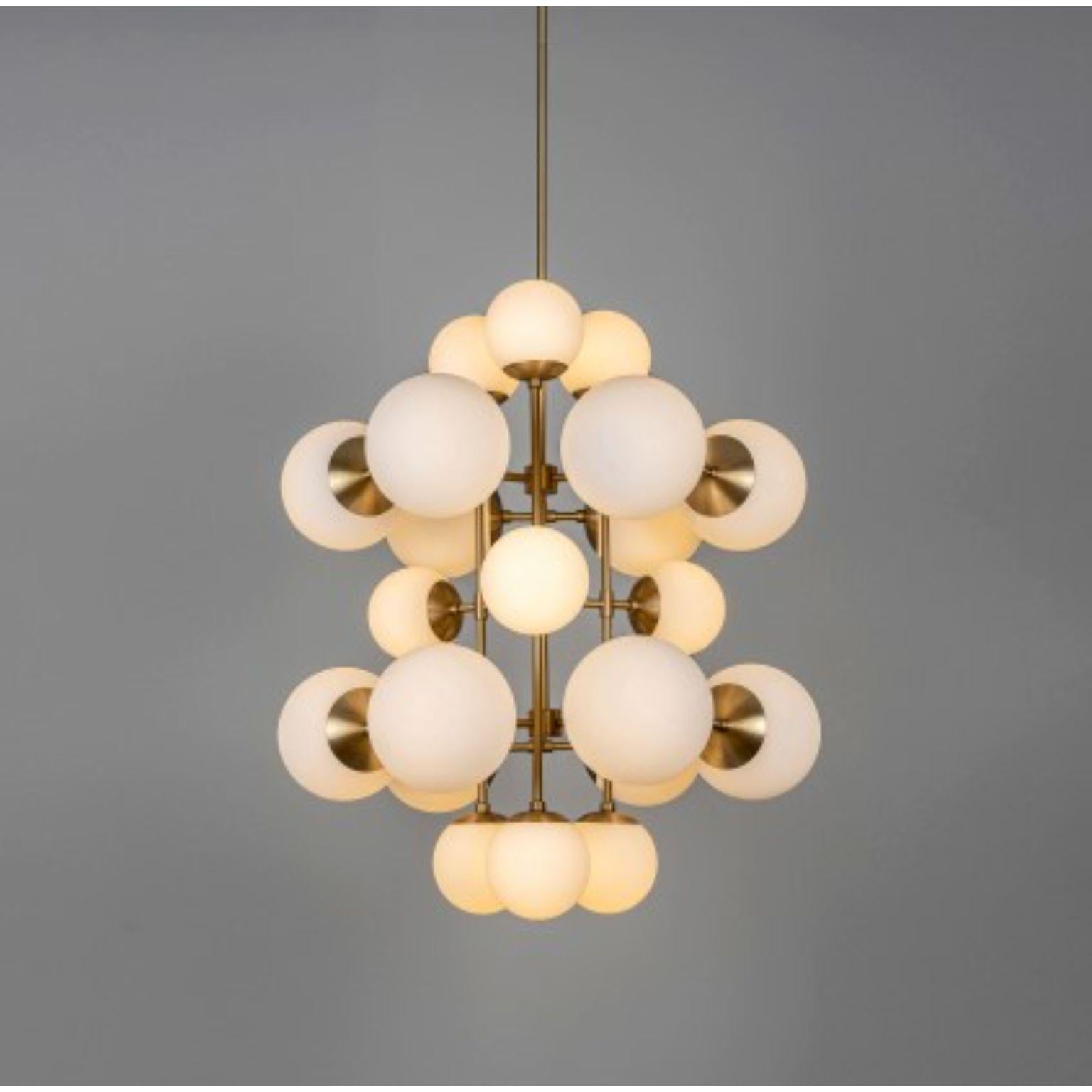 Glow Chandelier by Schwung
Dimensions: D80.5 x H 188.1 cm
Materials: brass, opal glass
Weight: 16.8 kg

Finishes available: black gunmetal, polished nickel, brass
Other sizes available. 

 Schwung is a german word, and loosely defined, means