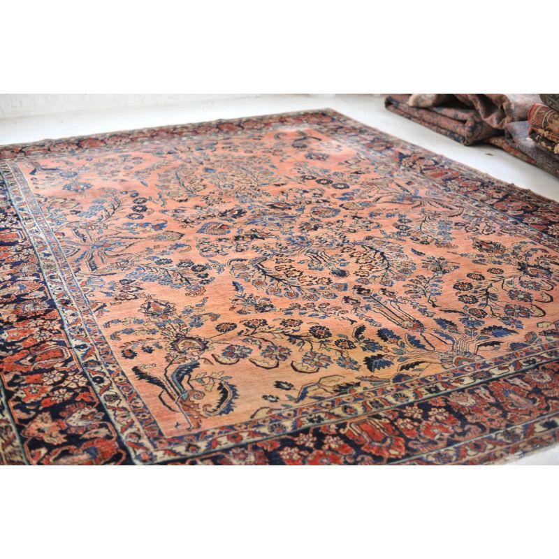Glowing Antique Botanical Sarouk Rug with Coral, Indigo & Peacock Blue Color In Good Condition For Sale In Milwaukee, WI