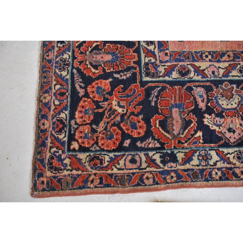 Glowing Antique Botanical Sarouk Rug with Coral, Indigo & Peacock Blue Color For Sale 1