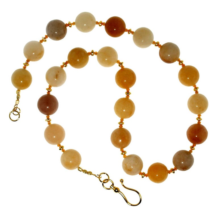 Autumn golden shades of Jade, 18 MM, enhanced with faceted Citrine rondelles and 22K yellow gold over brass rondelles. This one of a kind necklace is a perfect complement to your Fall wardrobe. The jade is dyed these lovely golden, beige, brown