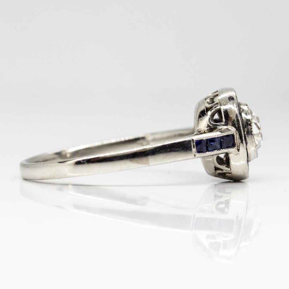 This lovely halo ring is centered with a prominent old mine cut diamond of I-SI1 quality that weighs 0.49ctw.
Crafted in solid platinum, this stunning piece of jewelry is embellished with 24 natural French cut sapphires that weigh 0.80ctw.
This