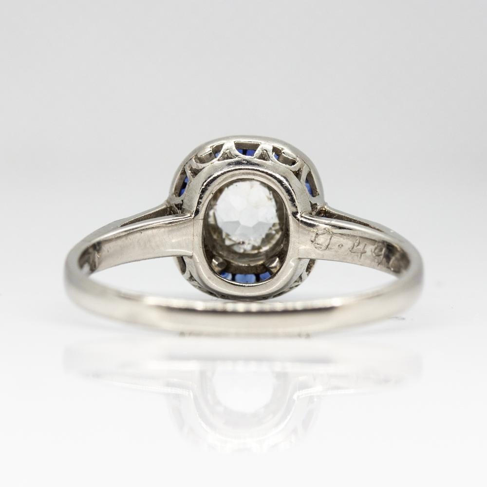 Art Deco Glowing Platinum Diamond and Sapphires Halo Ring