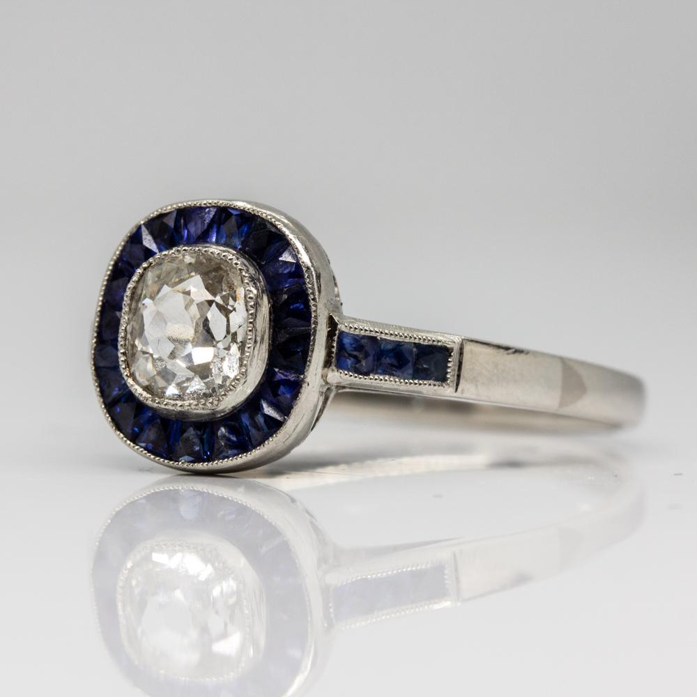 Old Mine Cut Glowing Platinum Diamond and Sapphires Halo Ring