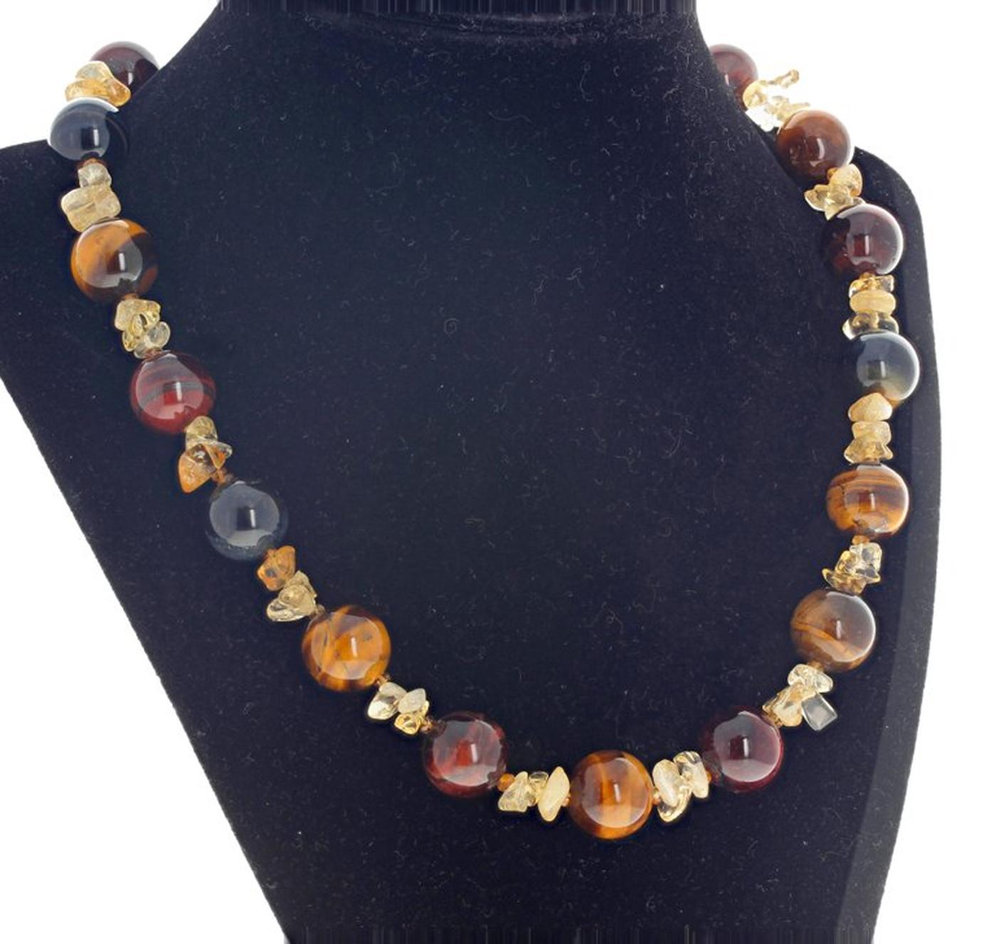 These beautiful highly polished 14 mm round TigerEye gems are enhanced with polished natural chunks of yellow Citrine and accented with tiny gem cut sparkling little Citrine gemstones. The Necklace is 17.5 inches long and the hook clasp is gold