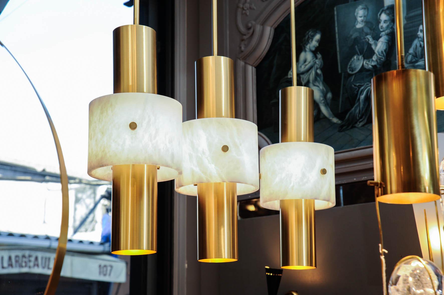 New creation by Glustin Luminaires, satin brass suspension with a central tube, circled by an enlighten alabaster ring.