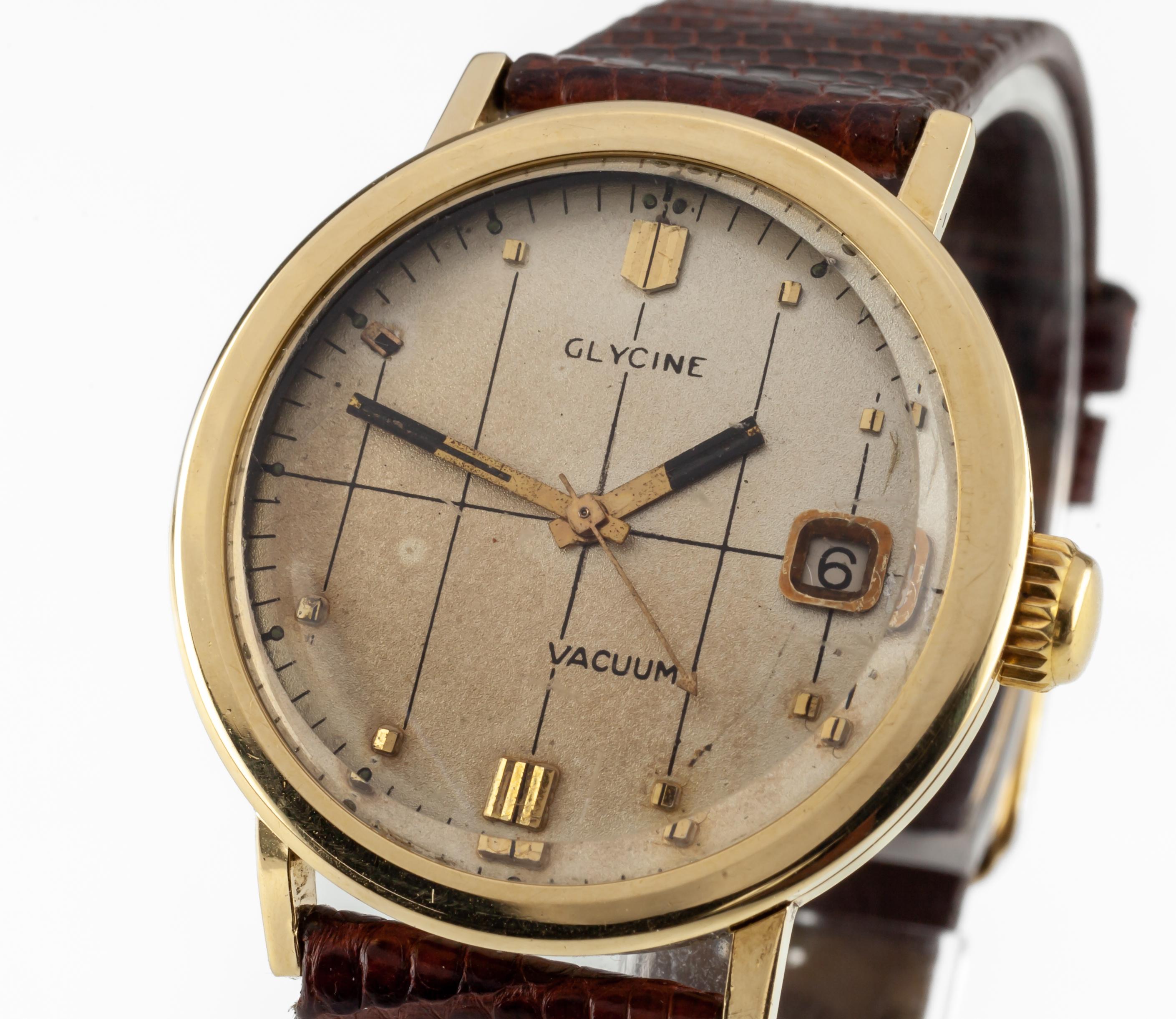
Glycine 18k Yellow Gold Men's Vintage Vacuum Automatic Watch 2472
Movement #2472
Case #0812-35367
18k Yellow Gold Round Case
34 mm in Diameter (36 mm w/ Crown)
Lug-to-Lug Distance = 40 mm
Lug-to-Lug Width = 17 mm
Thickness = 10 mm
Champagne Dial w/