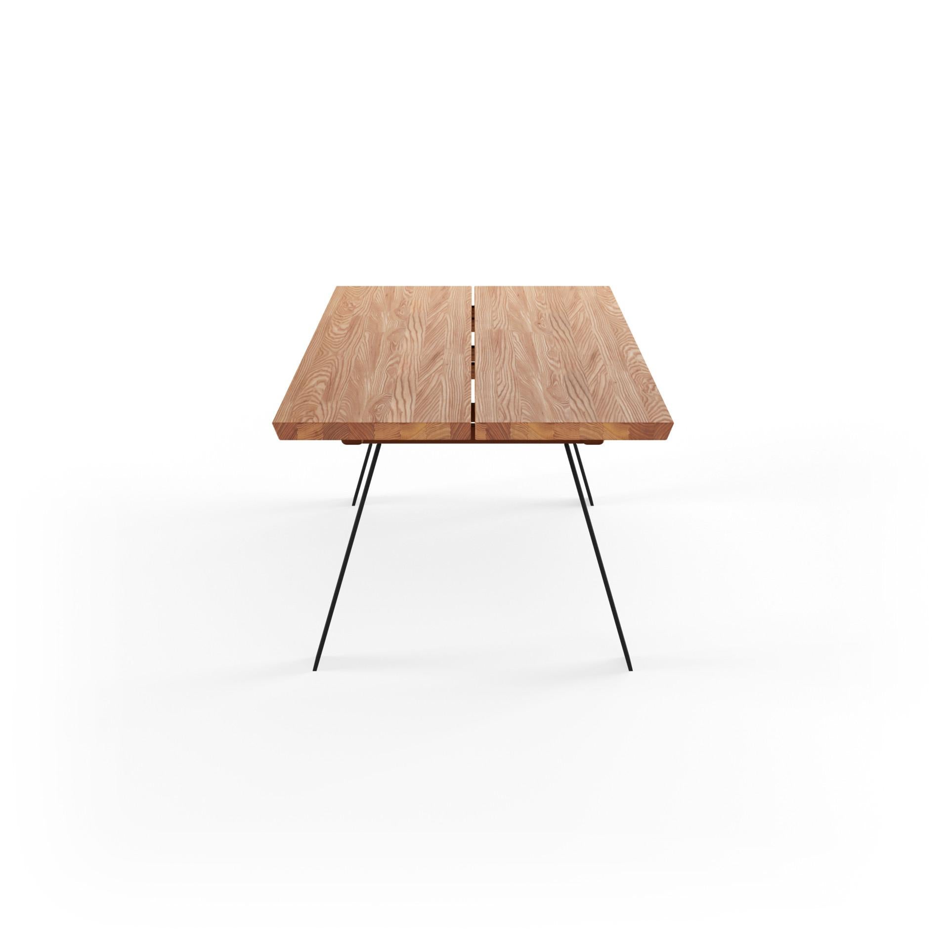 When designing the Plank table our design duo Nissen & Gehl combined the rustic look from solid wood planks with an elegant finish. The solid Plank table is made in the woods ash, oak, elm and walnut, and the table is extendable with up to two