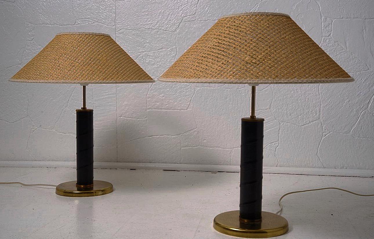 GMA700 a set of table lamps.

Beautiful and rare, with big ratten lamp-shades and a rustic lamp base in brass and black leather. 

GMA700 carries a bit of mystique around them. There’s no one who can find out the manufacture, even though they