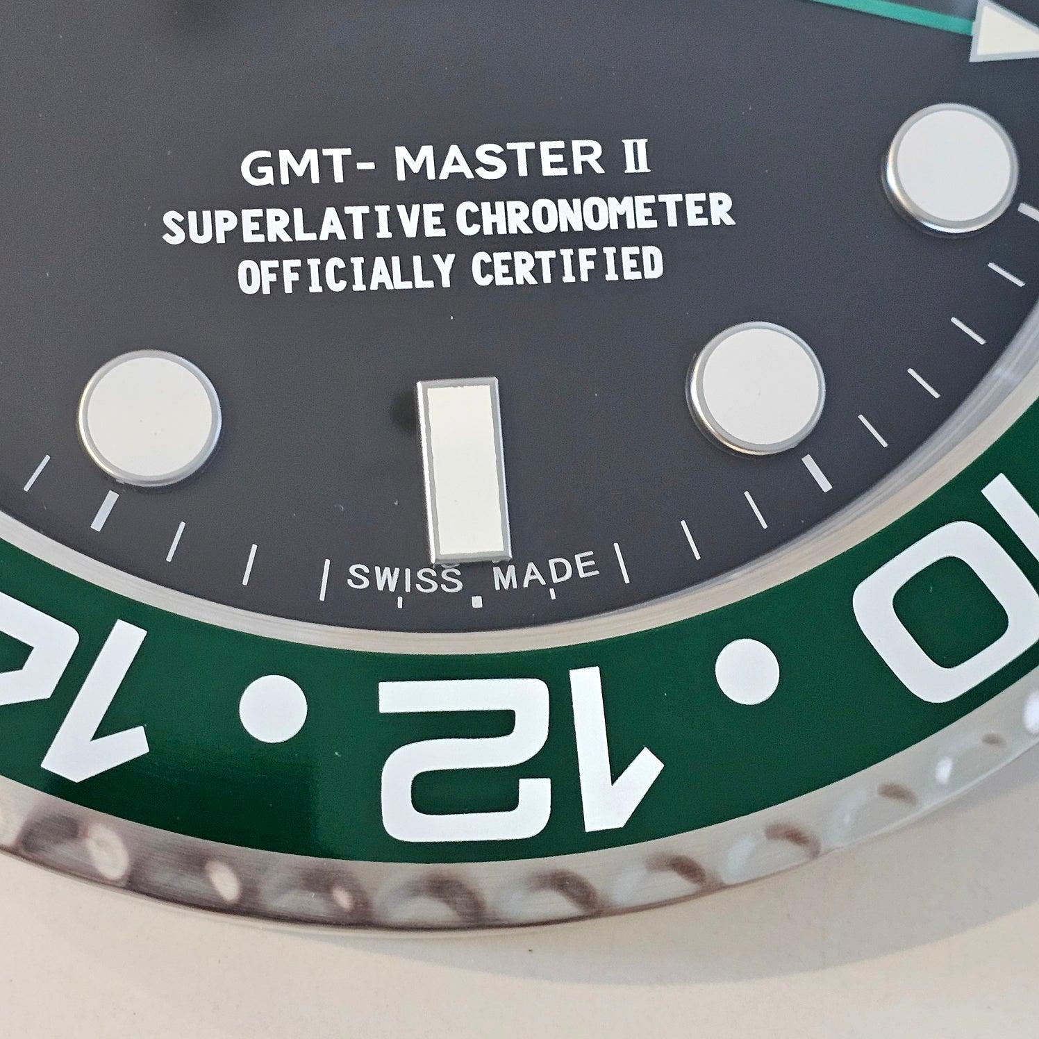 GMT-Master Store Display Wall Clock.

This is a very decorative wall clock depicting the wristwatch. The wall clock has been crafted in Switzerland with parts made up in stainless steel, aluminum and glass. All accented with black and green lacquer,