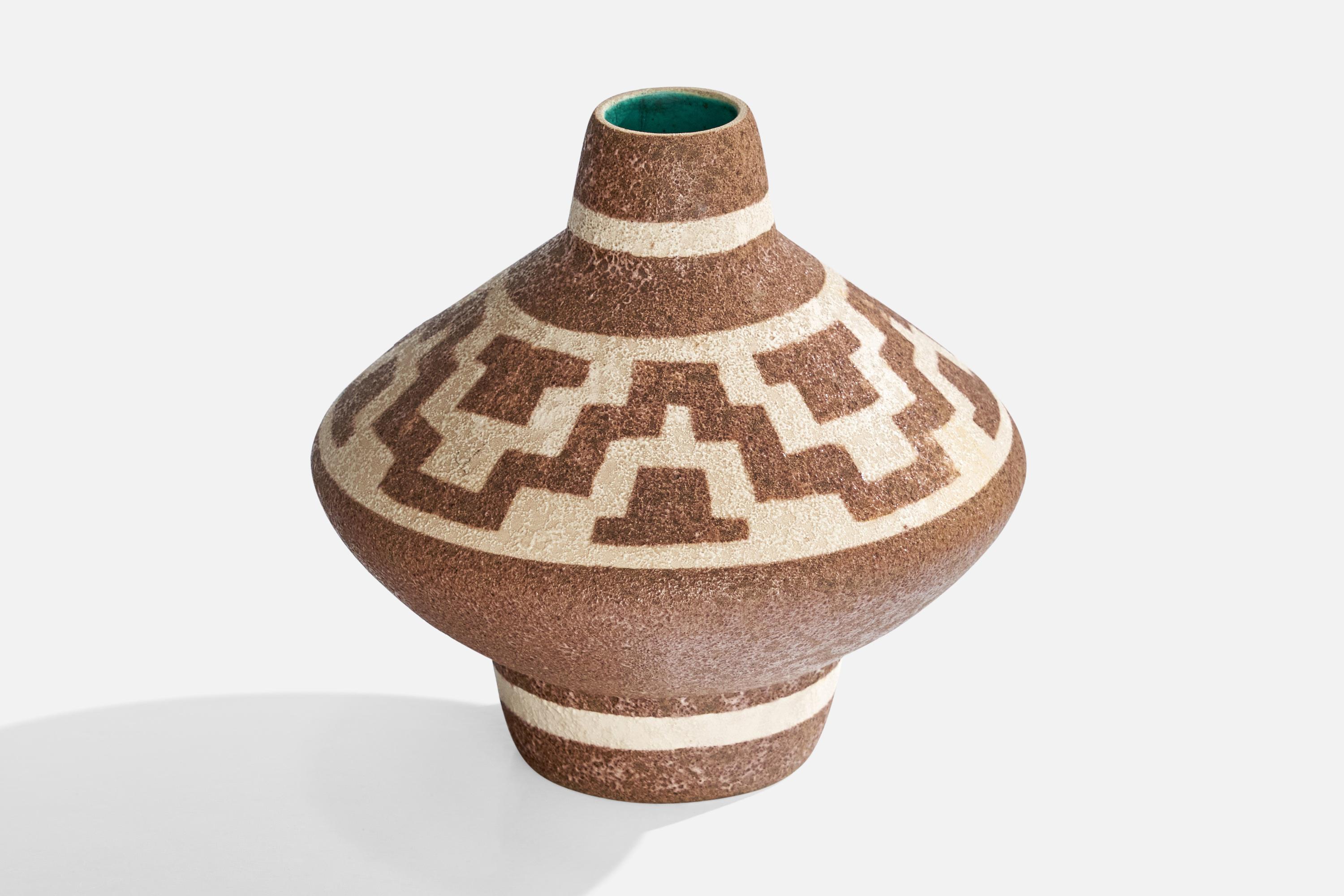 A brown, off-white and green-glazed ceramic vase designed and produced by Gmundner Keramik, Austria, c. 1960s.

Dimensions: 6.375” H x 6.625” diameter 
