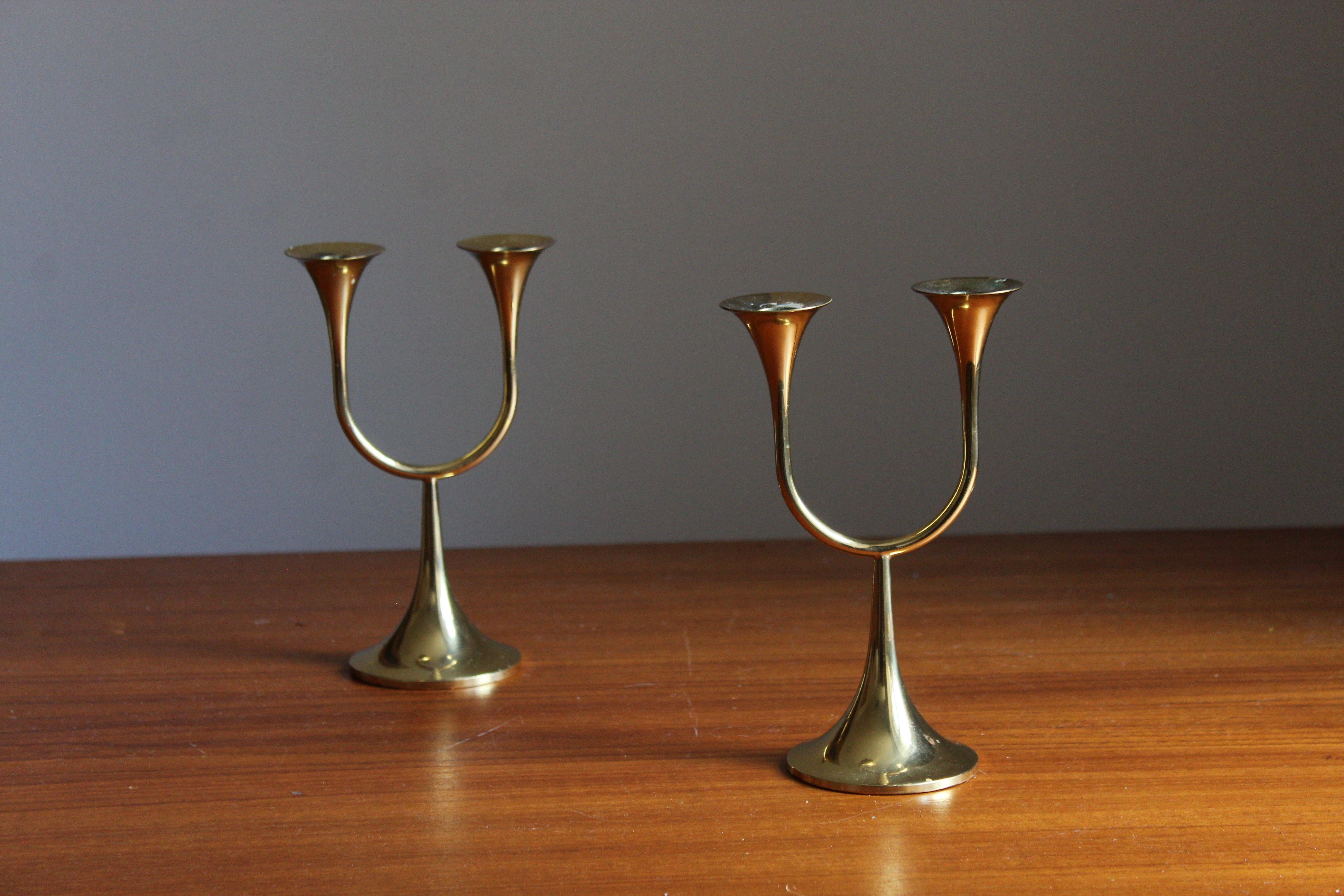A pair of small candlesticks. Holds small candles. Produced by Gnosjö, Sweden, 1960s-1970s. Stamped.