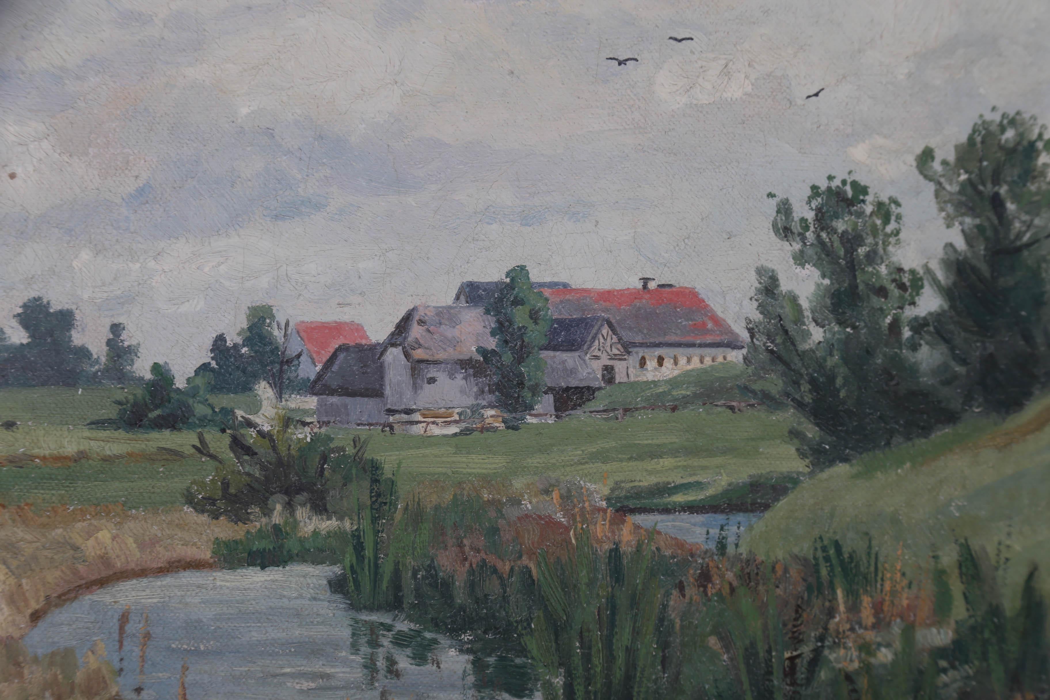 A charming early 20th Century oil landscape, showing a German farmstead near München. The artist has signed, inscribed the location and dated to the lower left corner. There is an indistinct inscription to the reverse of the canvas. On canvas. 
