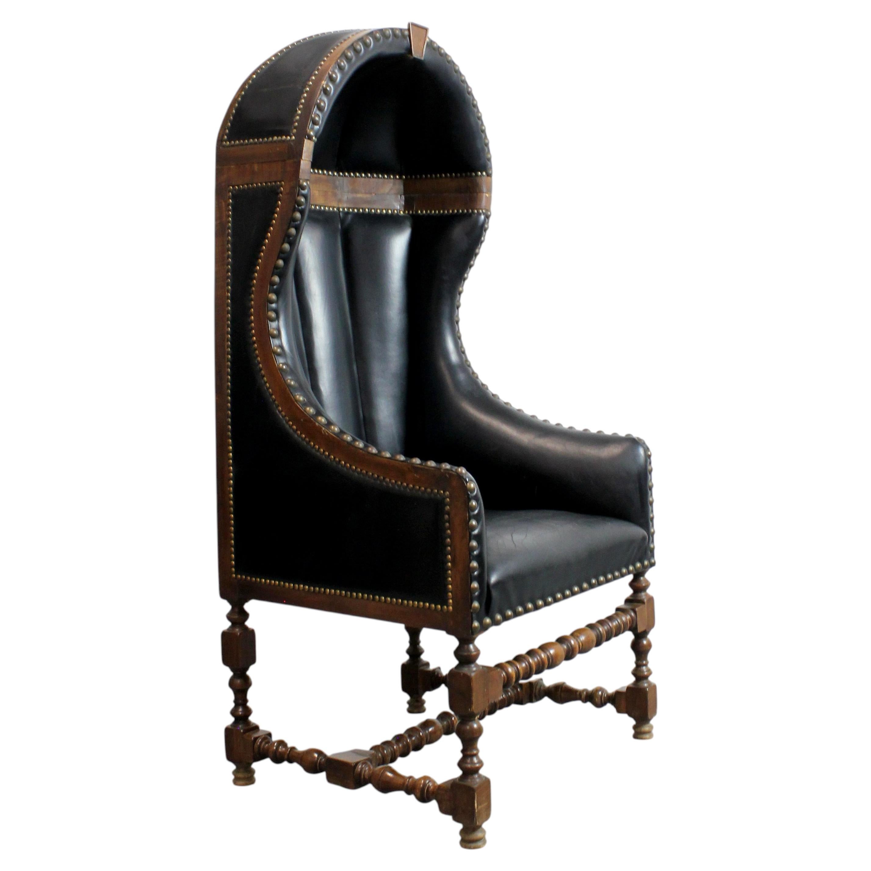 Goalkeeper's chair with turned wood frame and black leather upholstery For Sale