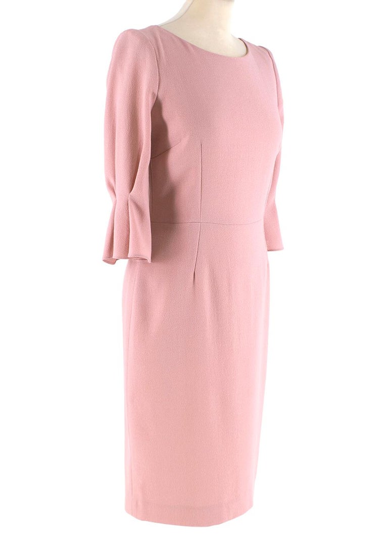 Goat Light Pink Wool Dress

- Wool round neck a-line midi dress 
- Cropped pleated sleeve 
- Concealed side zip and fully lined 

Materials 
100% Wool
Lining
63% Acetate 
37% Polyester 

Made In Romania 

Dry Clean Only 

Shoulder: 35 cm 
Chest: 42