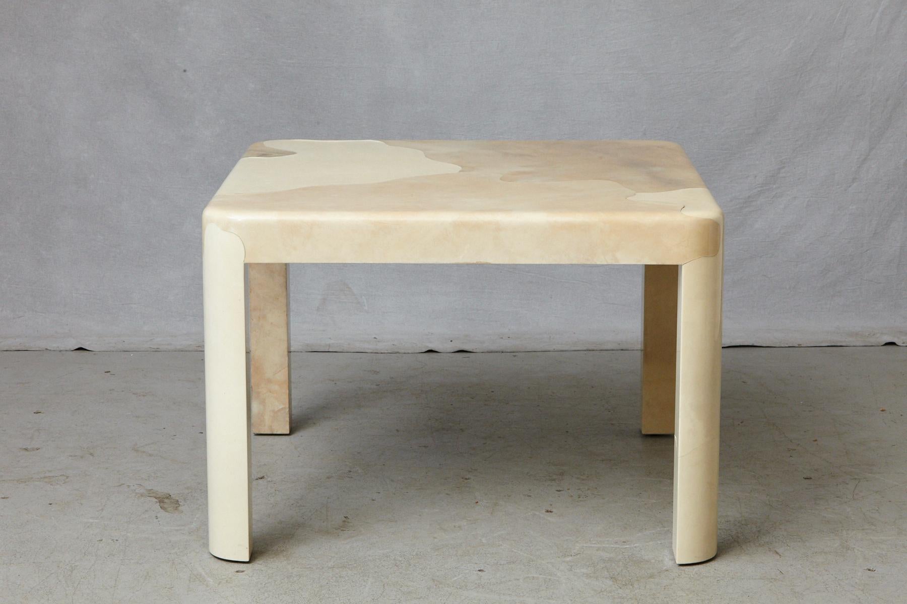 Large goatskin covered and lacquered dining table by Karl Springer, circa 1980s.
Some slight separations between the different goatskins at several locations and a round 25 cts large dent, please refer to plenty of detailed photos.
Height to apron