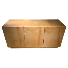 Credenza laccata in pelle di capra su base in ottone di Aldo Tura