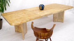 Tavolo da pranzo a due foglie con piedistallo allungabile in pergamena di capra