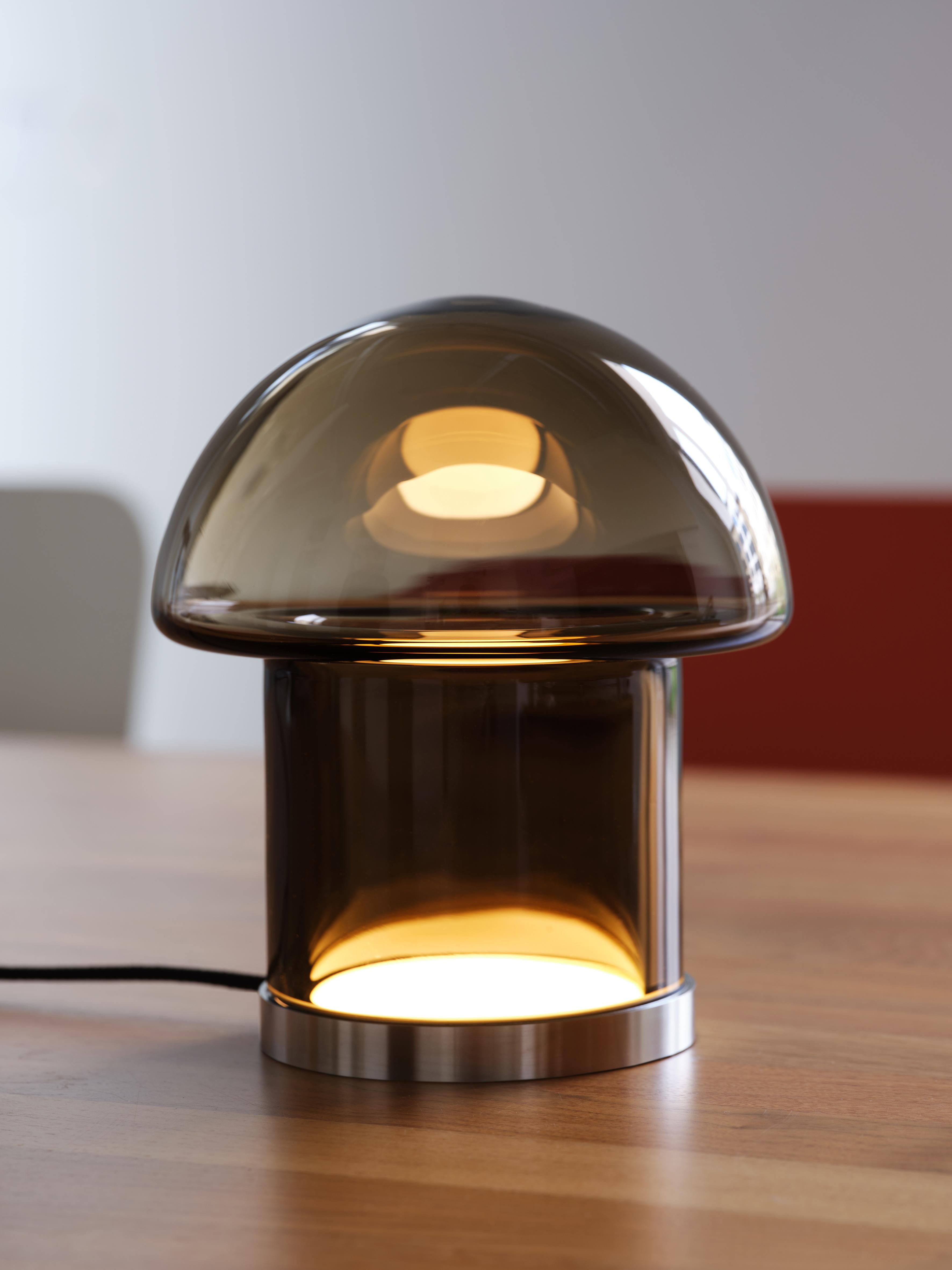GOBA 20 / clear glass bronze / base brass (gold)
- material: crystal glass, stainless steel
- sizes: H 20 cm, H 30 cm, H 40 cm / ø 18 cm 
- plug in driver with capacitive dimming + memory function (metal base) : 100 - 240 V (multi plug)
-