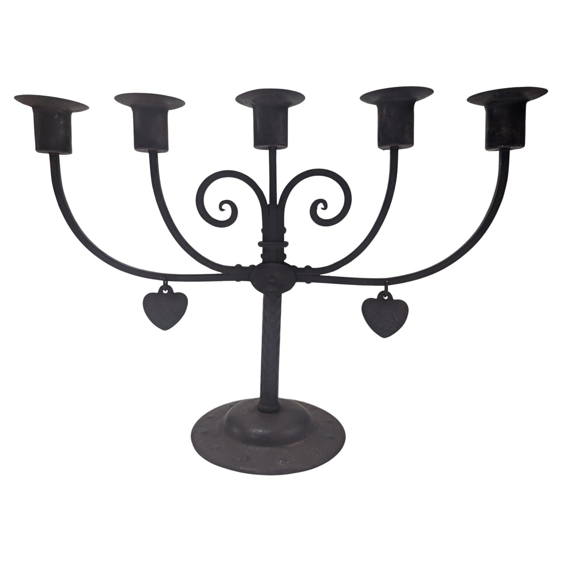 Goberg Germany Hugo Berger. Arts & Crafts five branch handmade iron candelabra.