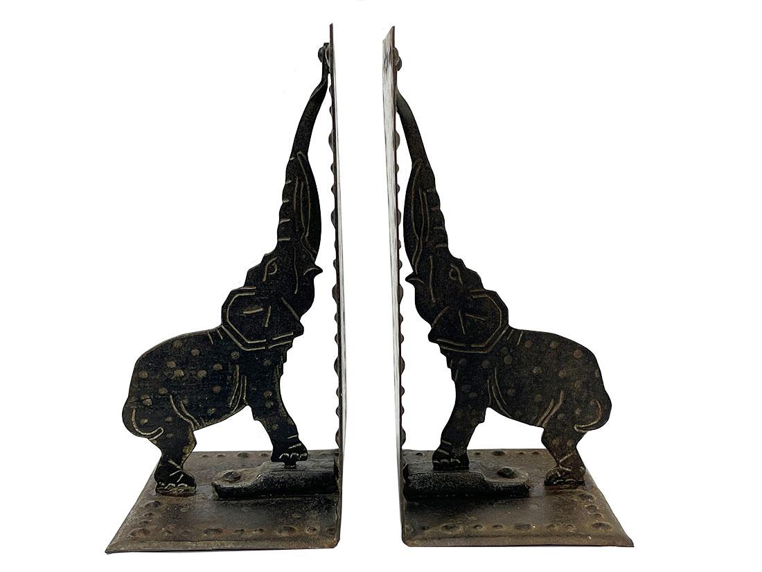 Goberg , Hugo Berger wrought iron bookends, Germany, circa 1910.

The Goberg brand is derived from the name of the maker Hugo Berger and had a workshop in Germany. He made many objects from wrought iron, such as tobacco boxes, cigar boxes,