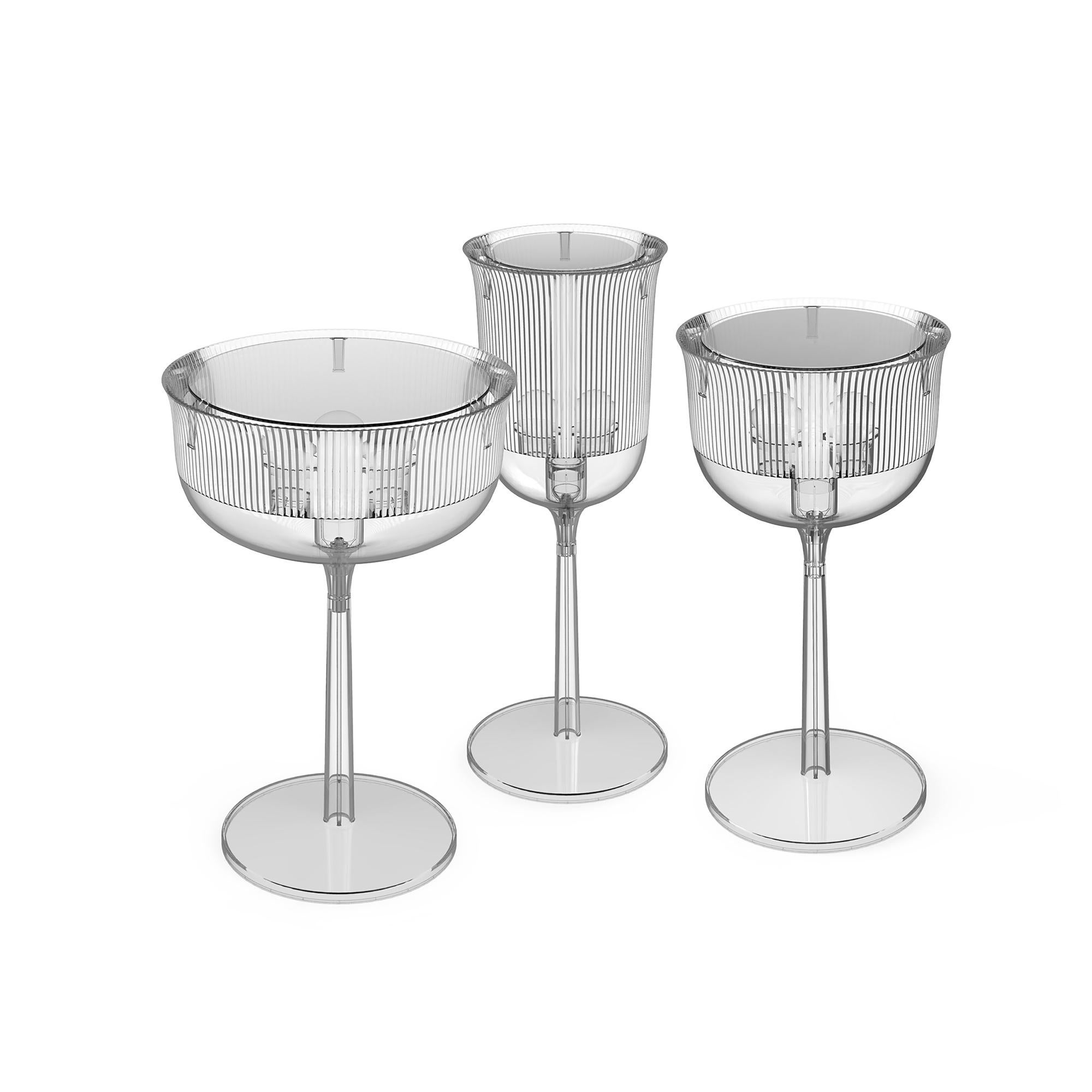 Goblets are the perfect cheers for your everyday space. The classic crystal glass, taken out from its original scale, acquires a new functionality, becoming a fine table lamp in three different shapes looking like a champagne flute, a goblet and a