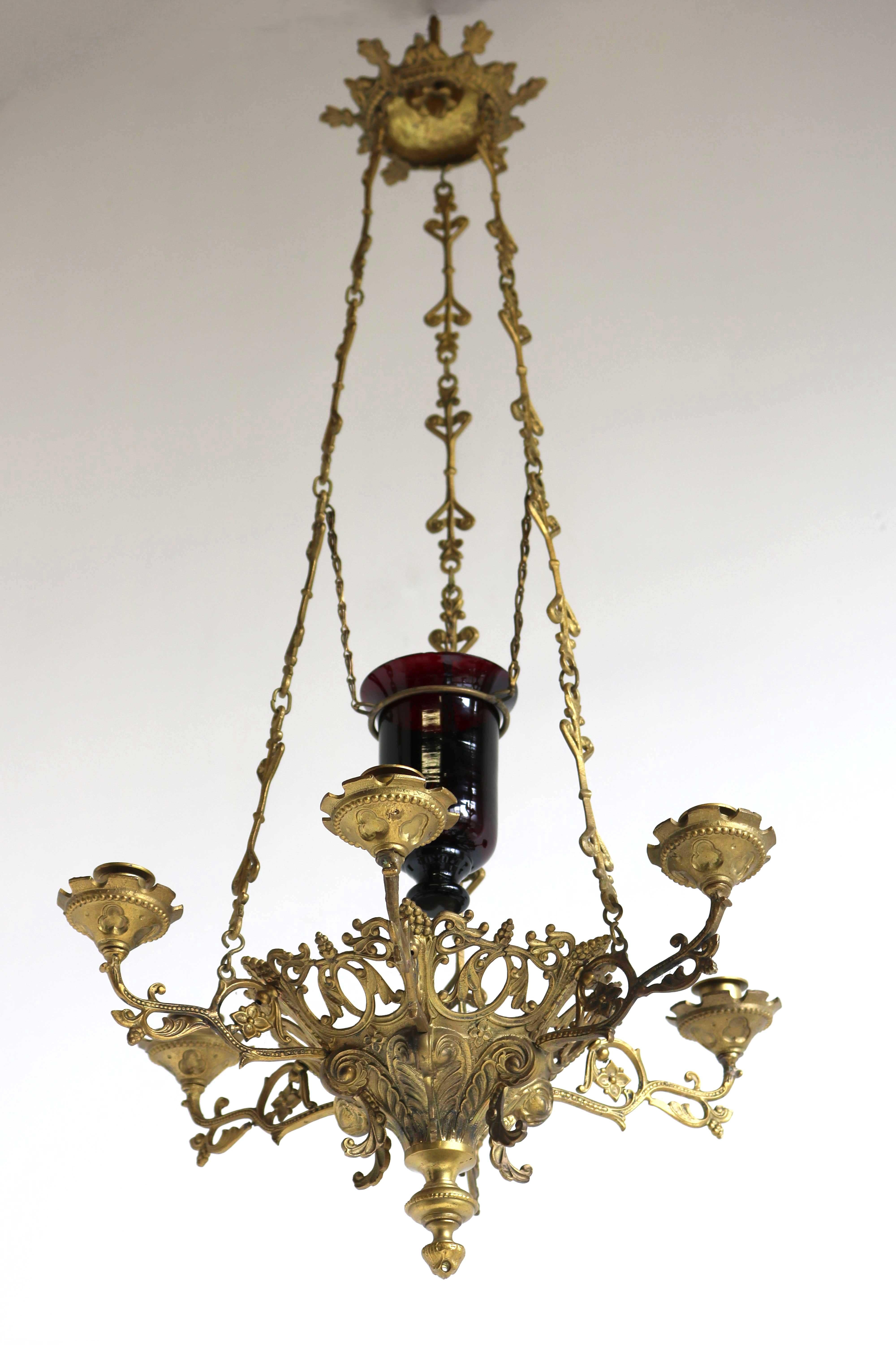God's Lamp/Church Chandelier brass early 20th century Sanctuary lamp Art Nouveau style

Beautiful authentic brass Church chandelier/God's lamp in graceful Art Nouveau style, made in the early 20th century. Gorgeous body with floral details