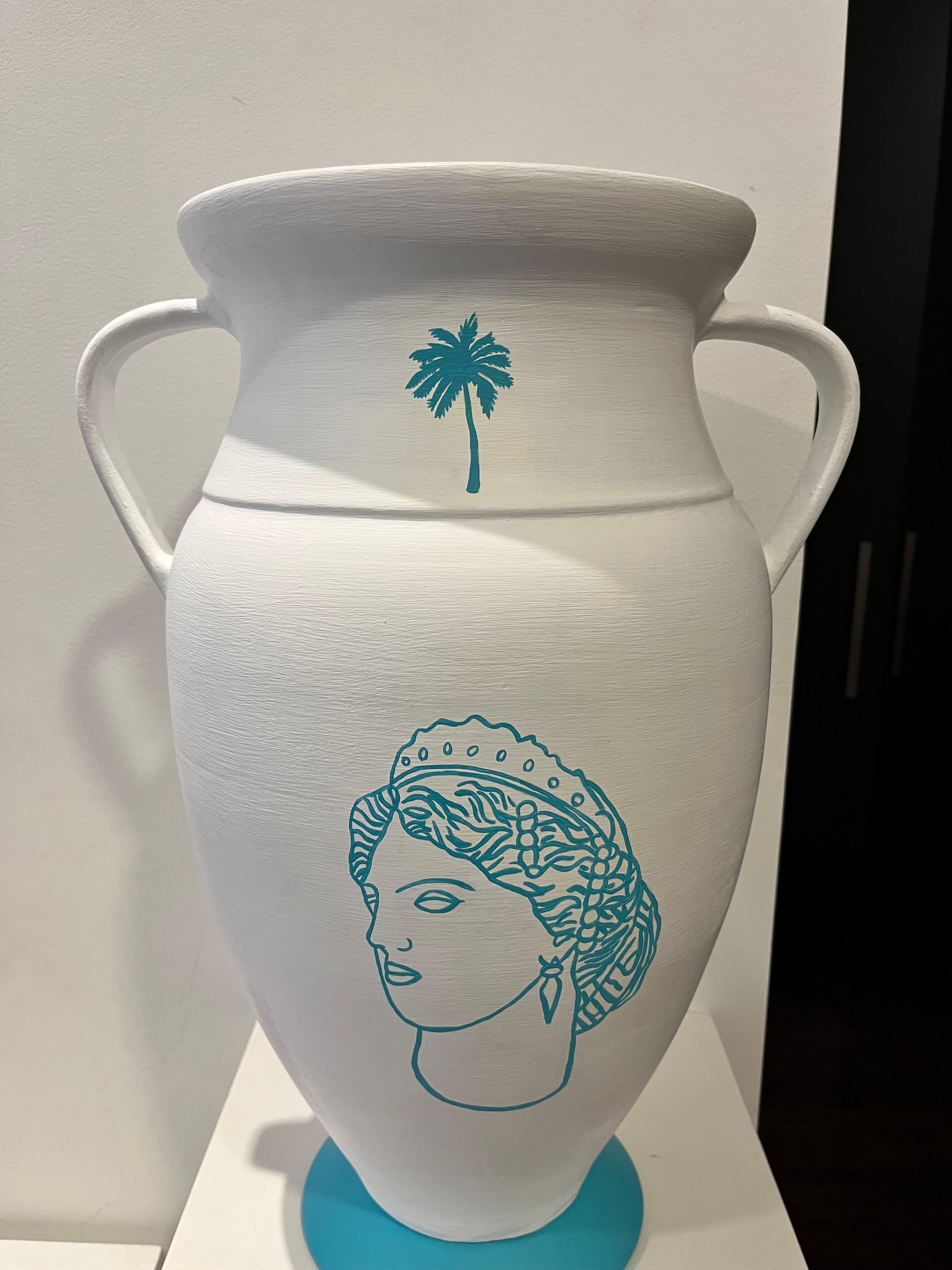 Goddess Circe, Amphora, 2023  Paloma Castello 
From the series Gynaeceum
Hand painted ceramic
Height : 51 cm
Width : 34.5 cm 
Opening Width: 25 cm 
Base Width: : 19 cm

Gineco (Gynaecium)
Two of the recurring themes in Paloma Castello's work