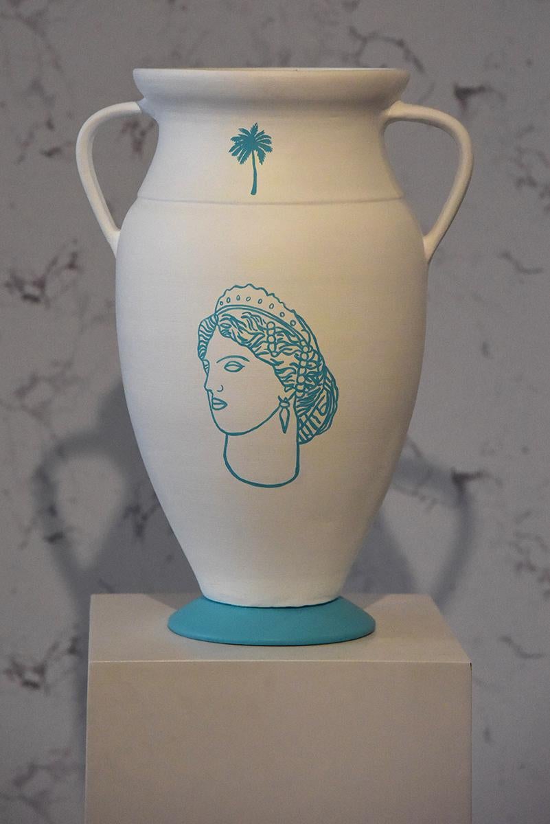 Goddess Circe, Amphora, 2023  Paloma Castello 
From the series Gynaeceum
Hand painted ceramic
Height : 51 cm
Width : 34.5 cm 
Opening Width: 25 cm 
Base Width: : 19 cm

Gineco (Gynaecium)
Two of the recurring themes in Paloma Castello's work