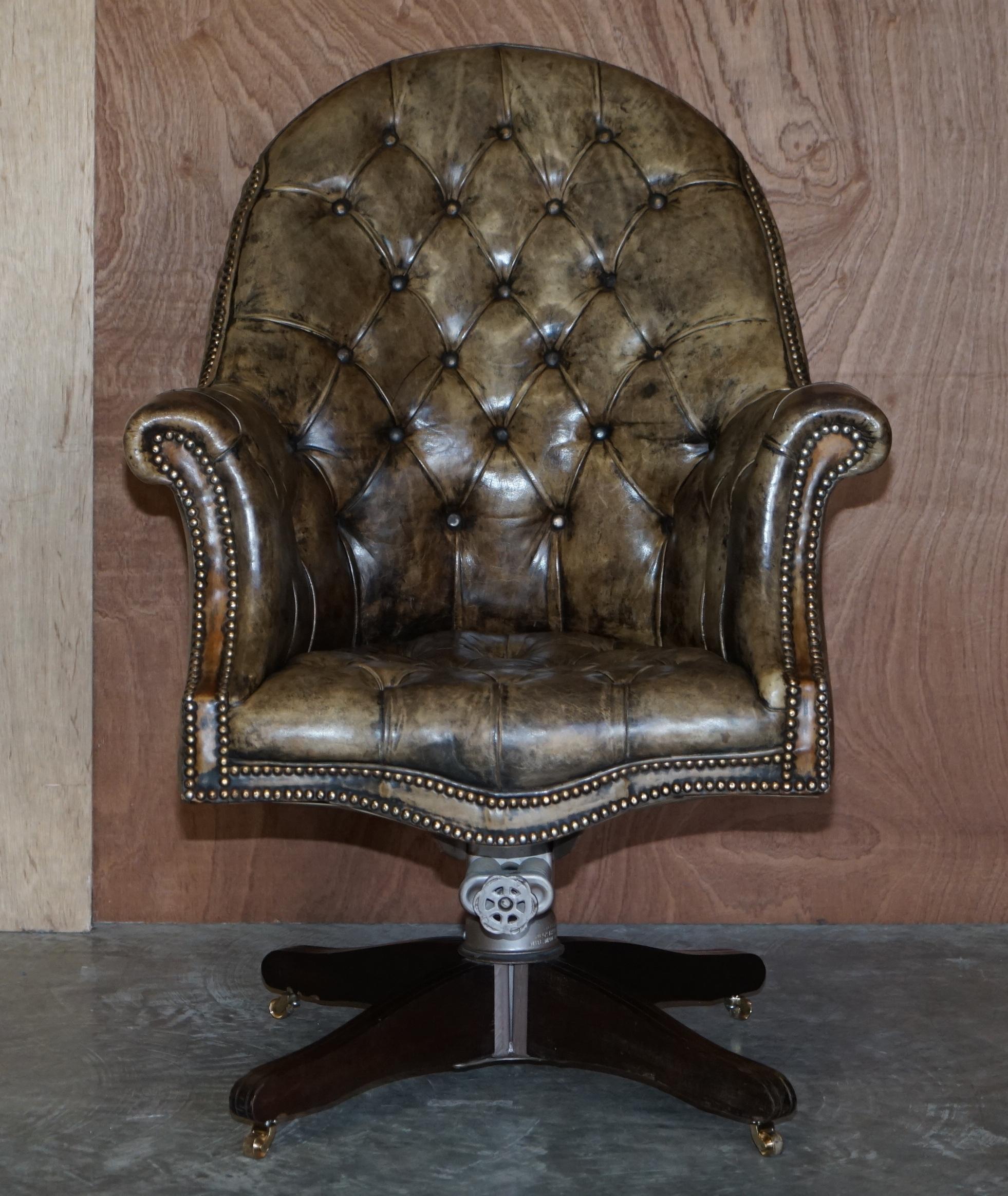 We are delighted to offer for sale this stunning original finish, aged leather Godfather Directors armchair with original Hillcrest base circa 1920’s

This is a very fine and well made English circa 1920’s Directors chair, it has a coil sprung