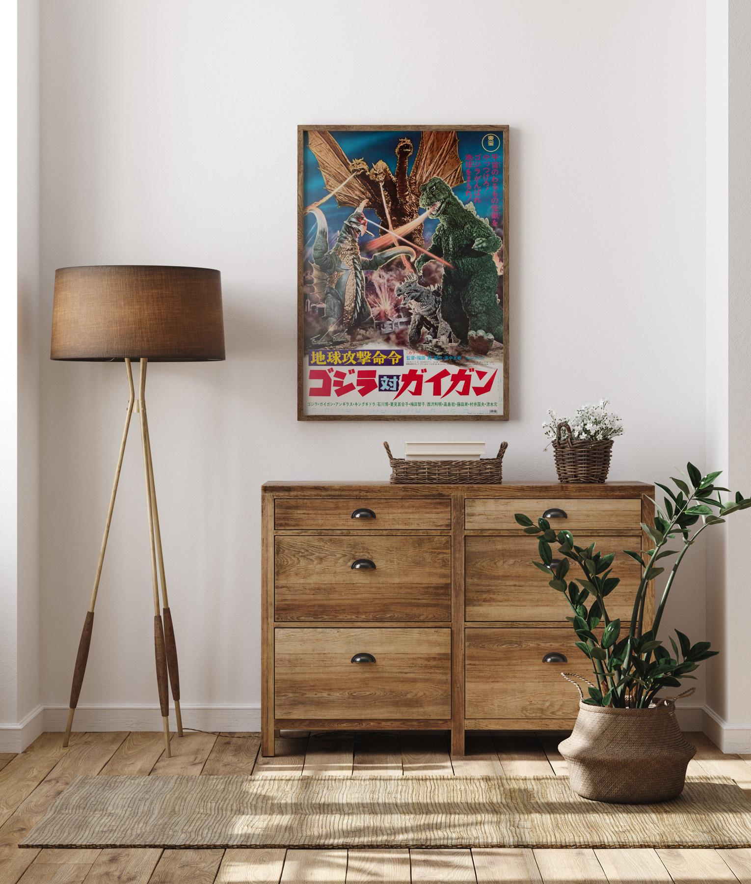 The fantastic country-of-origin Japanese poster for Godzilla vs Gigan. In wonderful Near Mint rolled condition.

Japanese design typically features wonderful montage imagery using bold, strong colours and hand-crafted typography. This poster being a