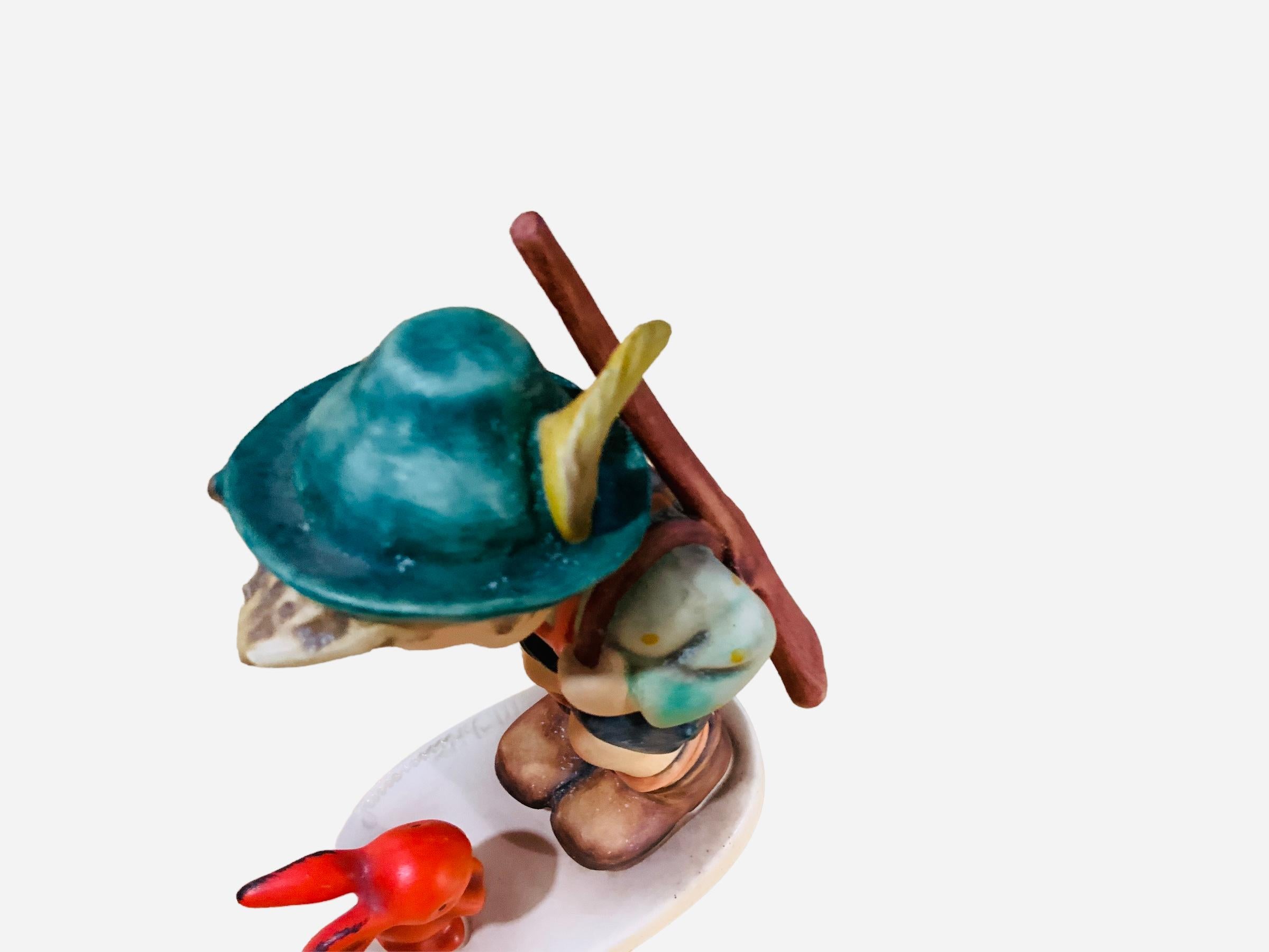 Romantic Goebel Company Hummel Porcelain Figurine Boy “Sensitive Hunter” For Sale