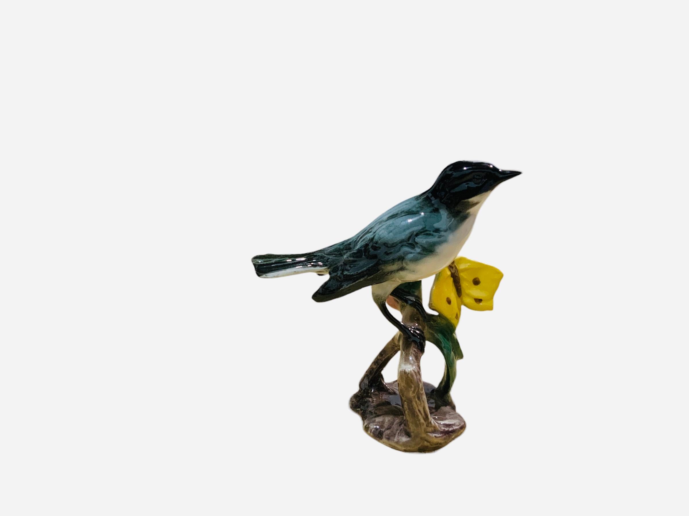 Molded Goebel Porcelain Hand Painted Bird Figurine of an Orphan Warbler