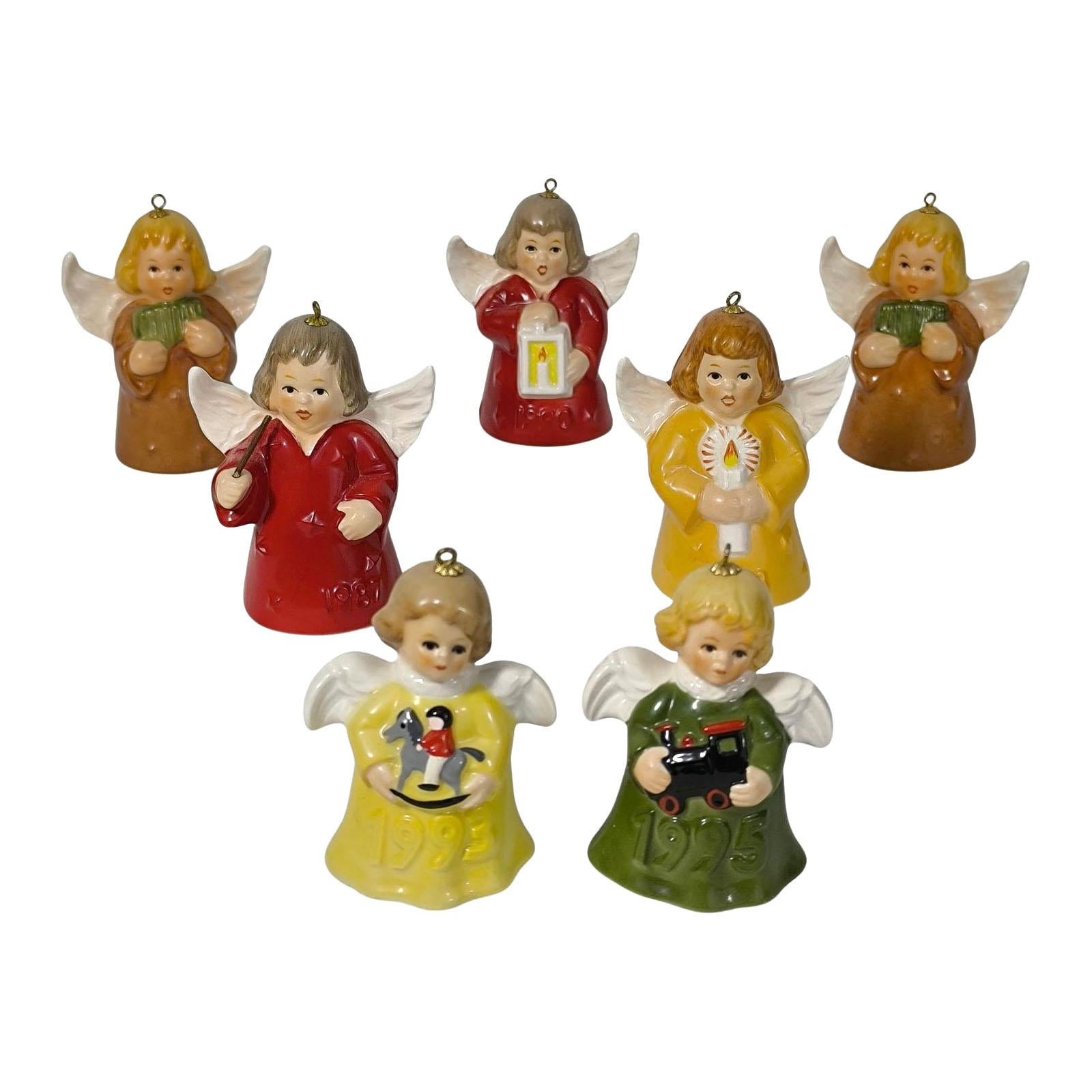 Goebel Set of Seven Vintage Annual Angel Bells Christmas Tree Ornaments, 
Germany 1980s - 1990s.
Rare collector's item, hard to find.
This is a set of 7 pcs very nice ornaments from the Goebel, annual angel bells Christmas tree ornament, each