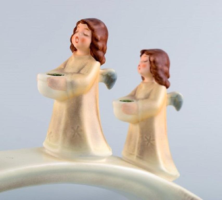 Goebel, West Germany. Advent candleholder with angels in porcelain. Dated 1971.
Measures: 30 x 16.5 cm.
In excellent condition.
Stamped.