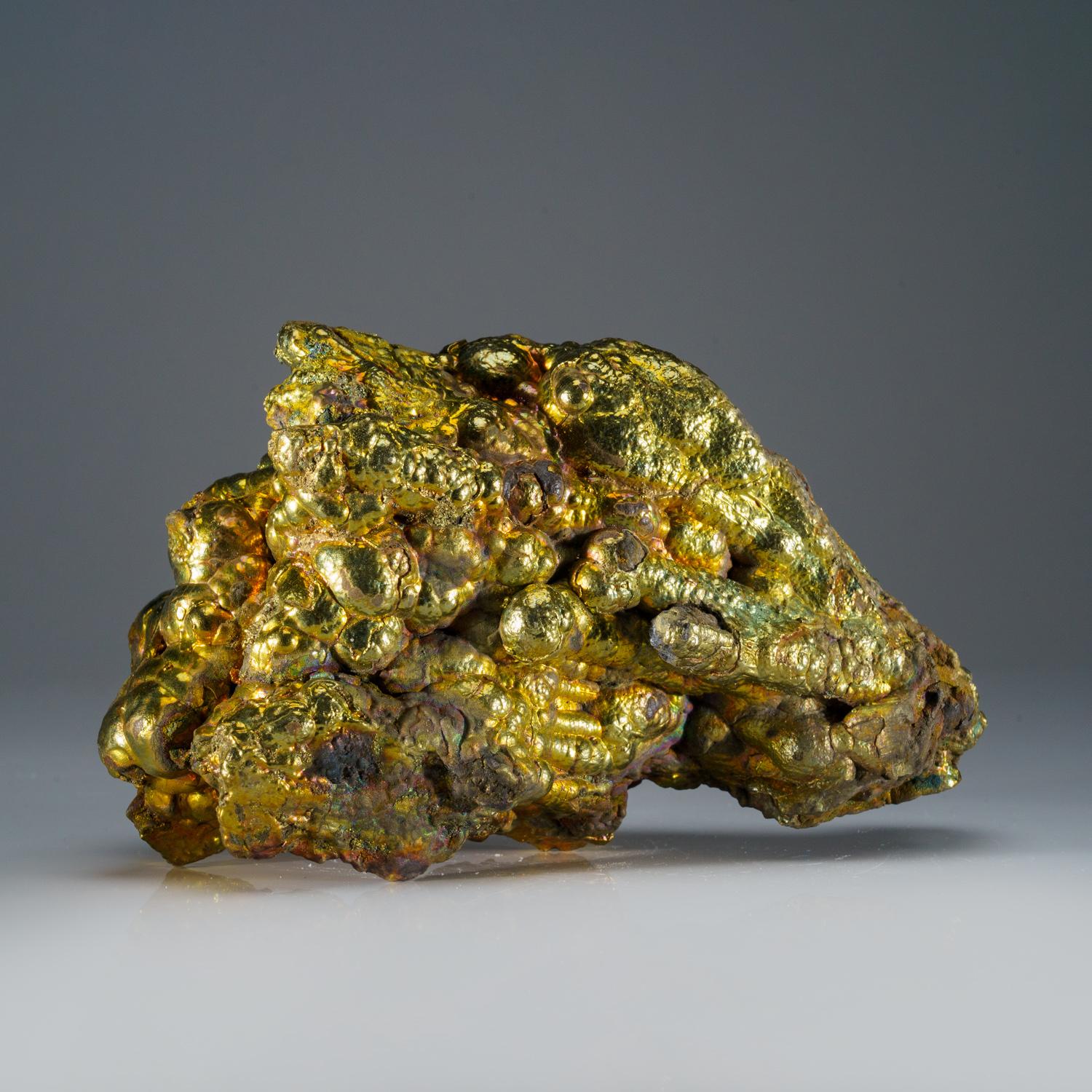 From Wulashan Au deposit, Wulashan mining district, Binhe New District, Baotou City (Baotou Prefecture), Inner Mongolia, China.

Beautiful specimen of botryoidal goethite with colorful iridescent surfaces grading from yellow, to green to