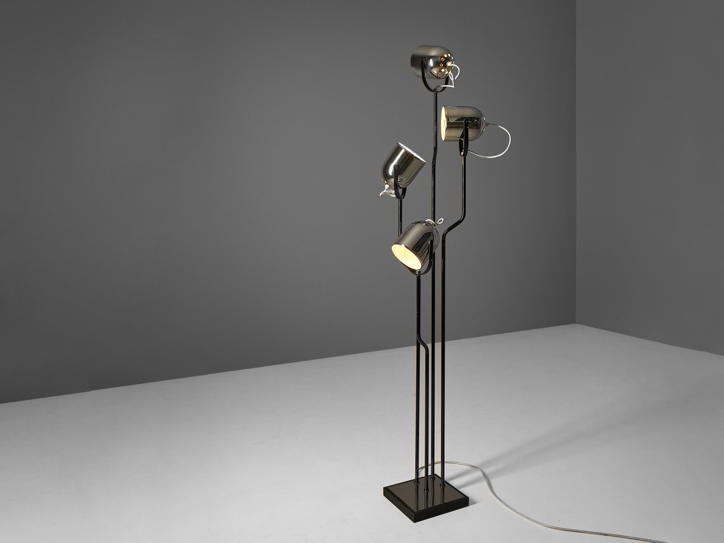 Goffredi Reggiani, floor lamp, chrome-plated steel, iron, mirror, Italy, 1970s.

This floor lamp by Italian designer Goffredi Reggiani is both functional and aesthetically pleasing to the eyes. The design features four light sources, each of them