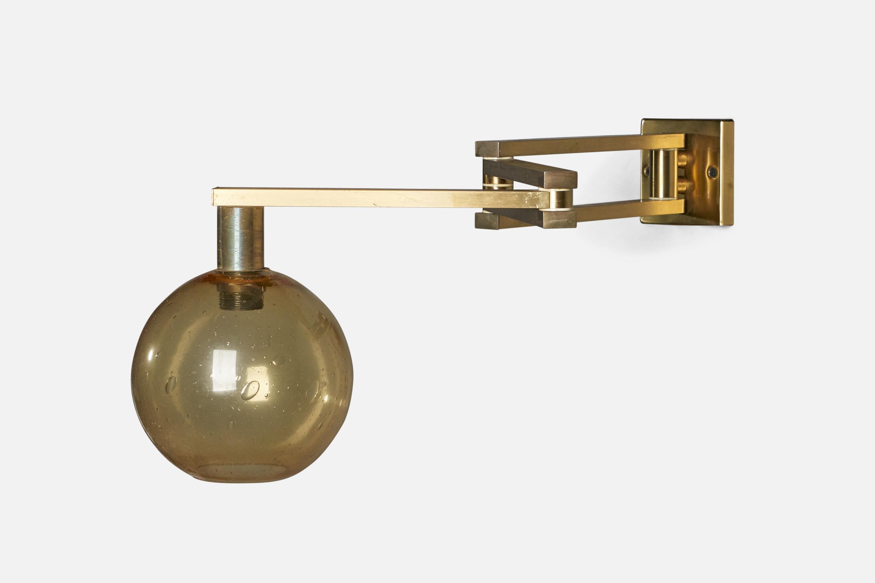 An adjustable brass and glass wall light designed and produced by Goffredo Reggiani

Fully Expanded Dimensions (inches): 12.25