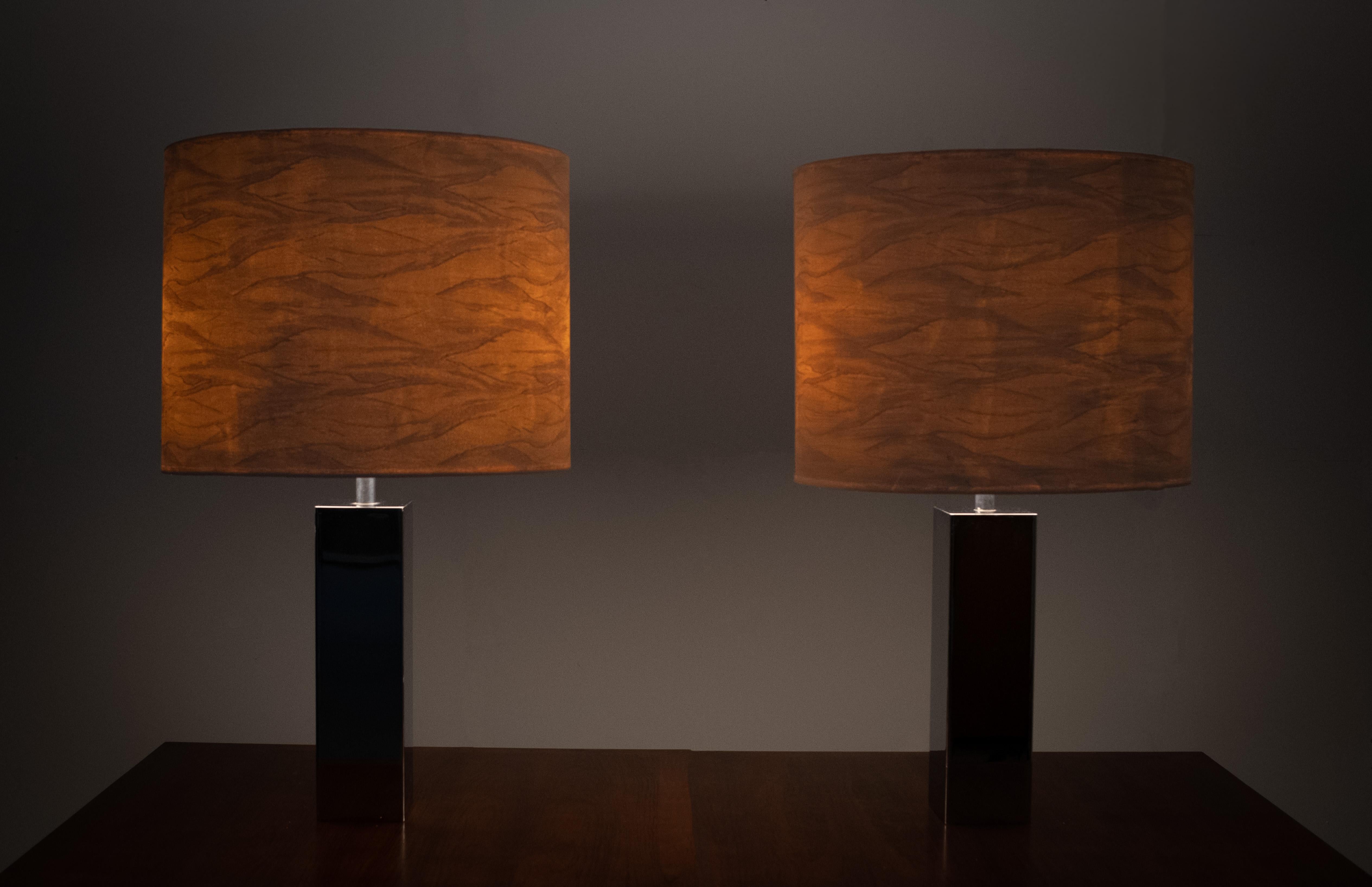 Pair of large square chrome table lamps by Goffredo Reggiani Italy 1960s . Three bulbs each switch 
separately. Very good condition and quality. Included the shades.