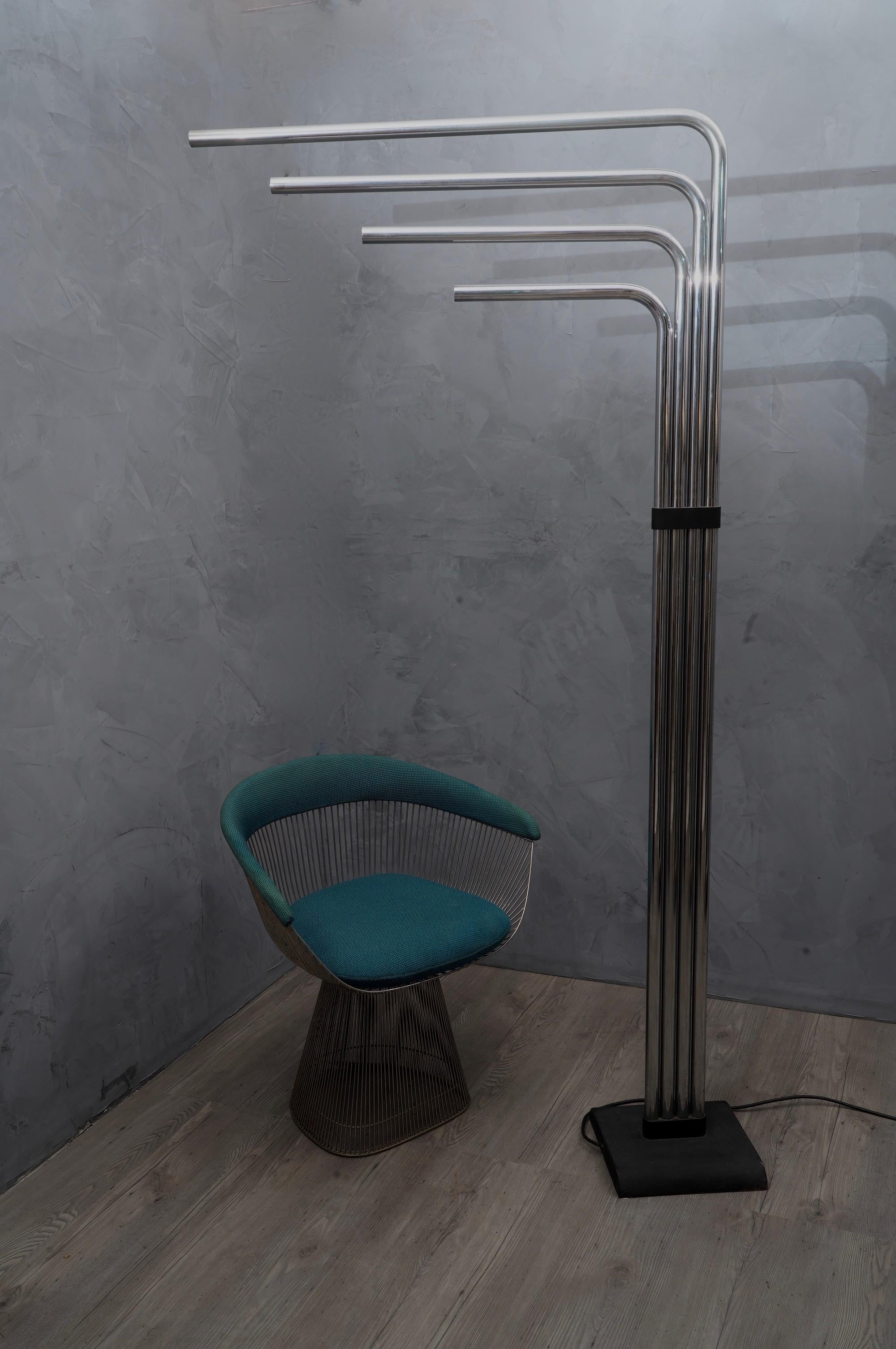 Architectural and sculptural floor lamp with articulated arms in metal chrome. Icon of the Italian design, Goffredo Reggiani was a signature of the Italian Renaissance design from 1950s. It's an important maker like Sciolari, Artemide, Stilnovo