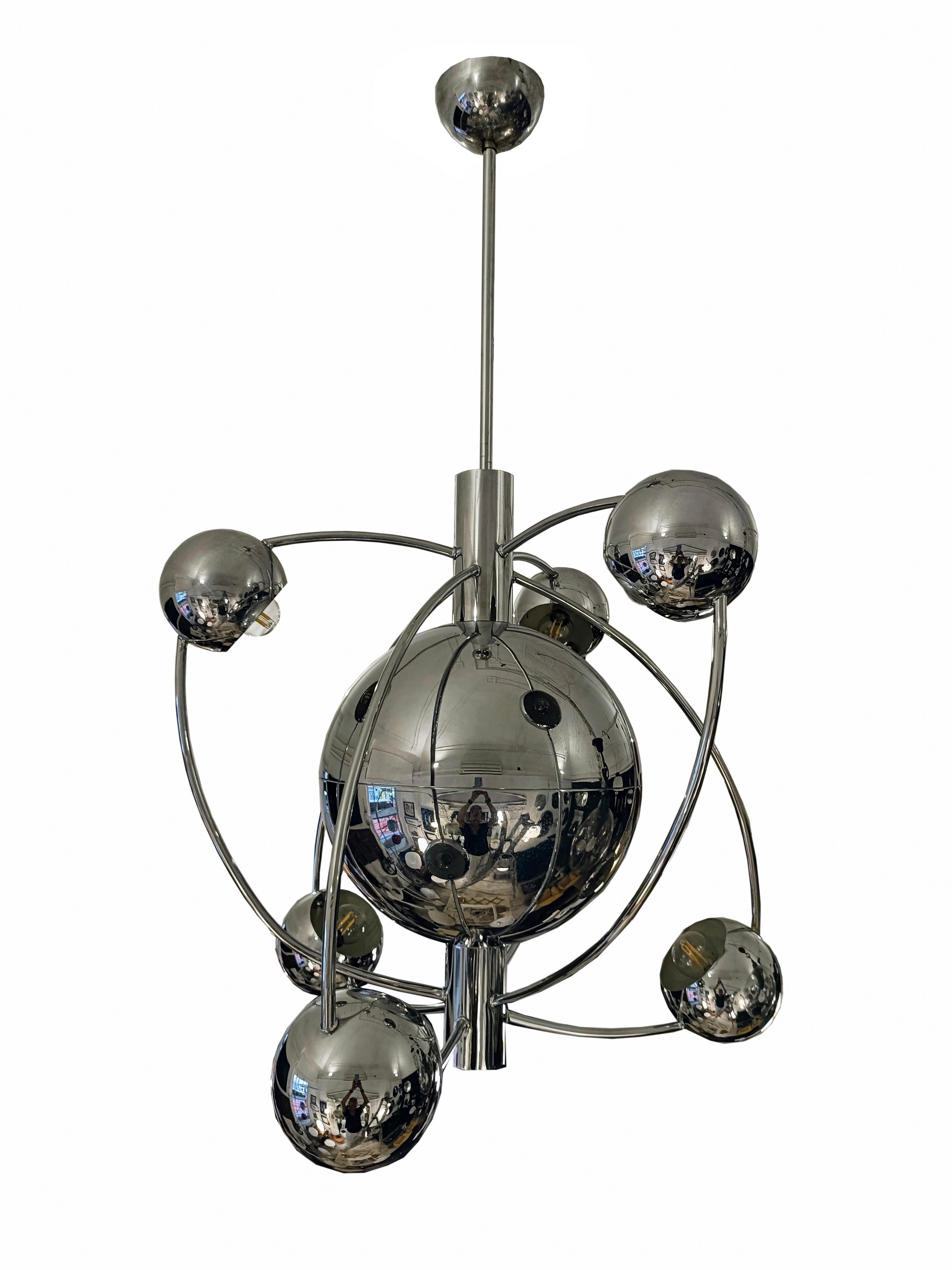 Satellite chandelier with six chrome lights by Goffredo Reggiani. Six round directional lights orbiting a central sphere. Seventies in pure space age style