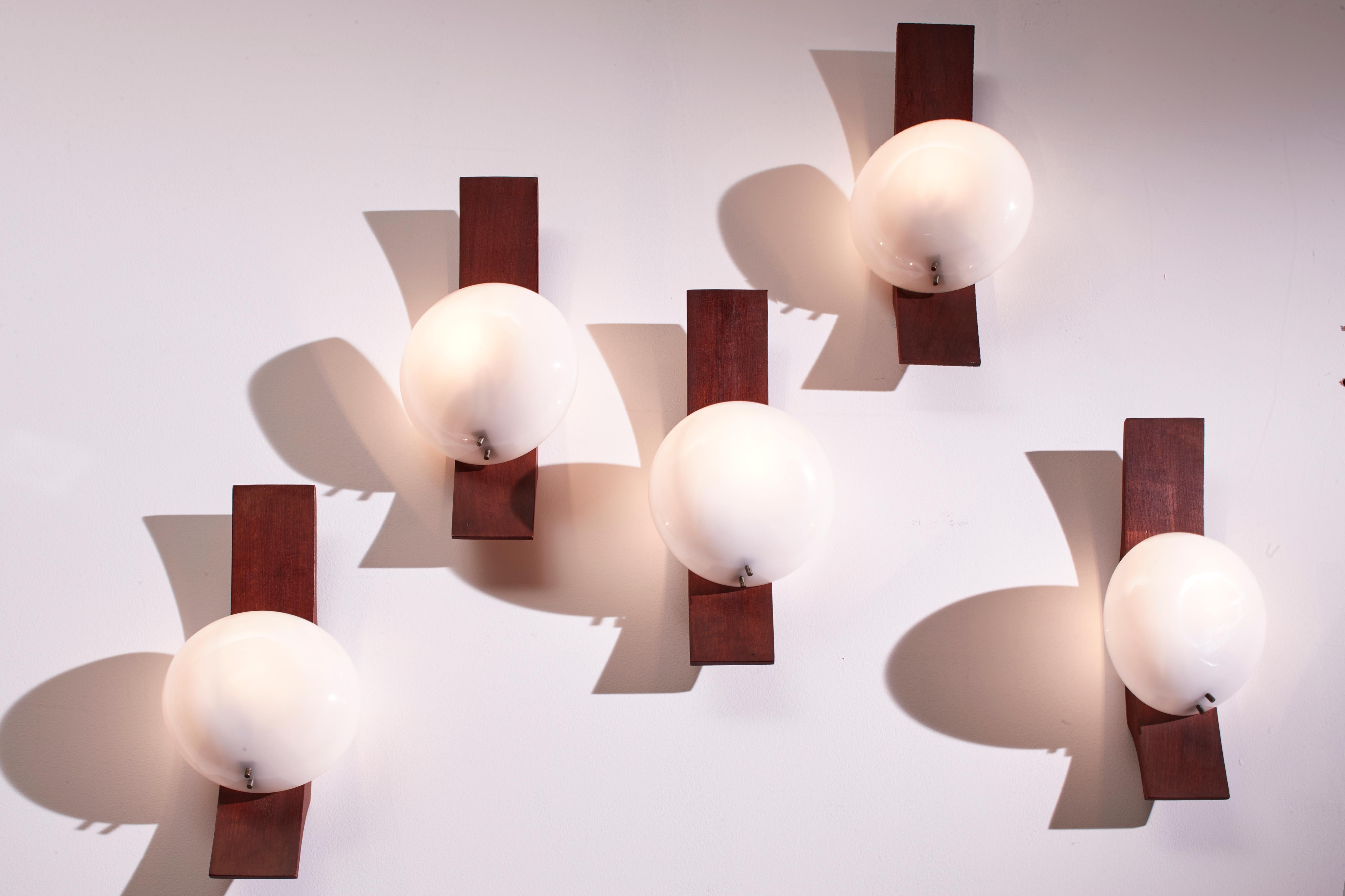 Goffredo Reggiani set of five teak and perspex wall lights, Italy, 1960s 3
